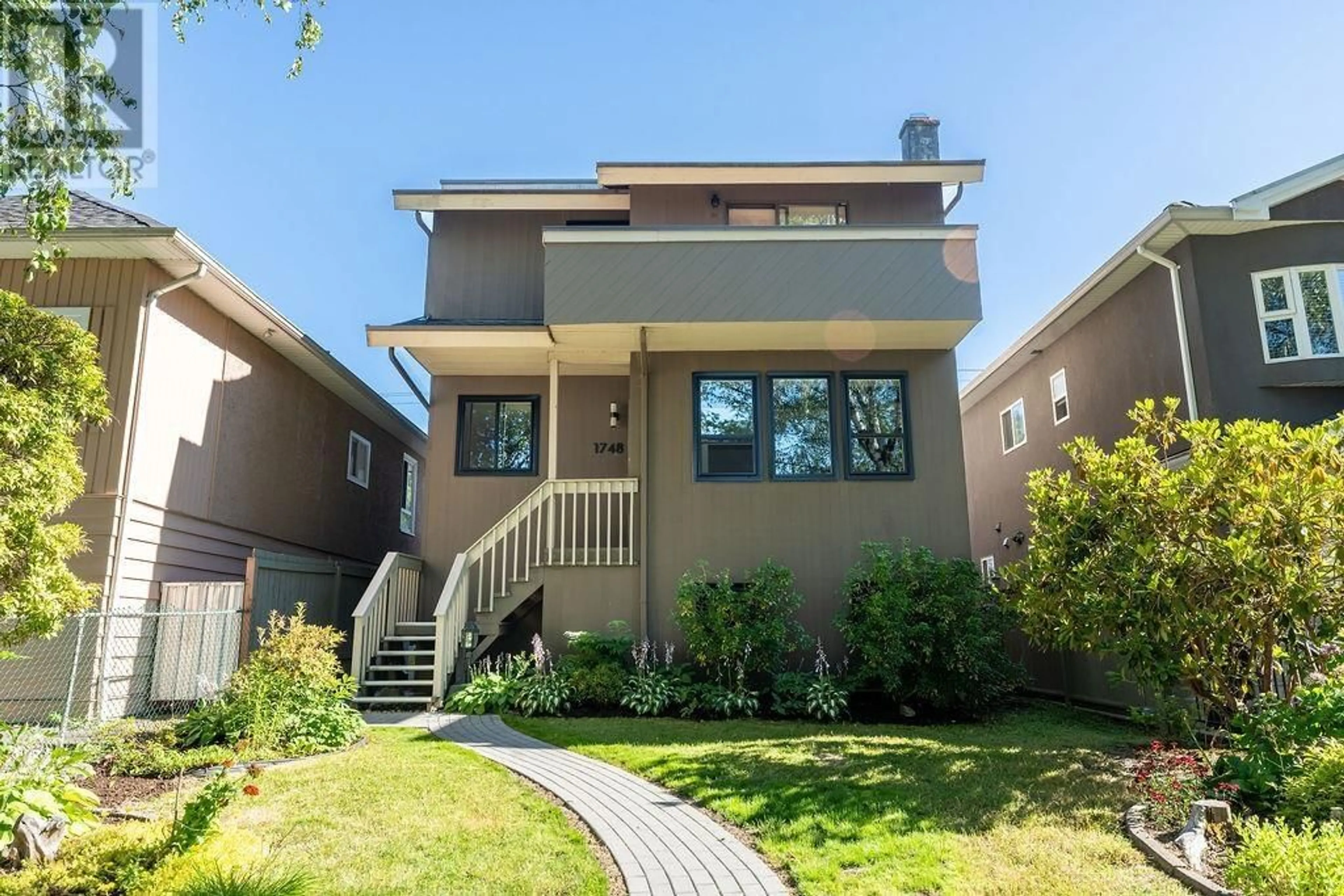 Frontside or backside of a home for 1748 E 36 AVENUE, Vancouver British Columbia V5P1C5