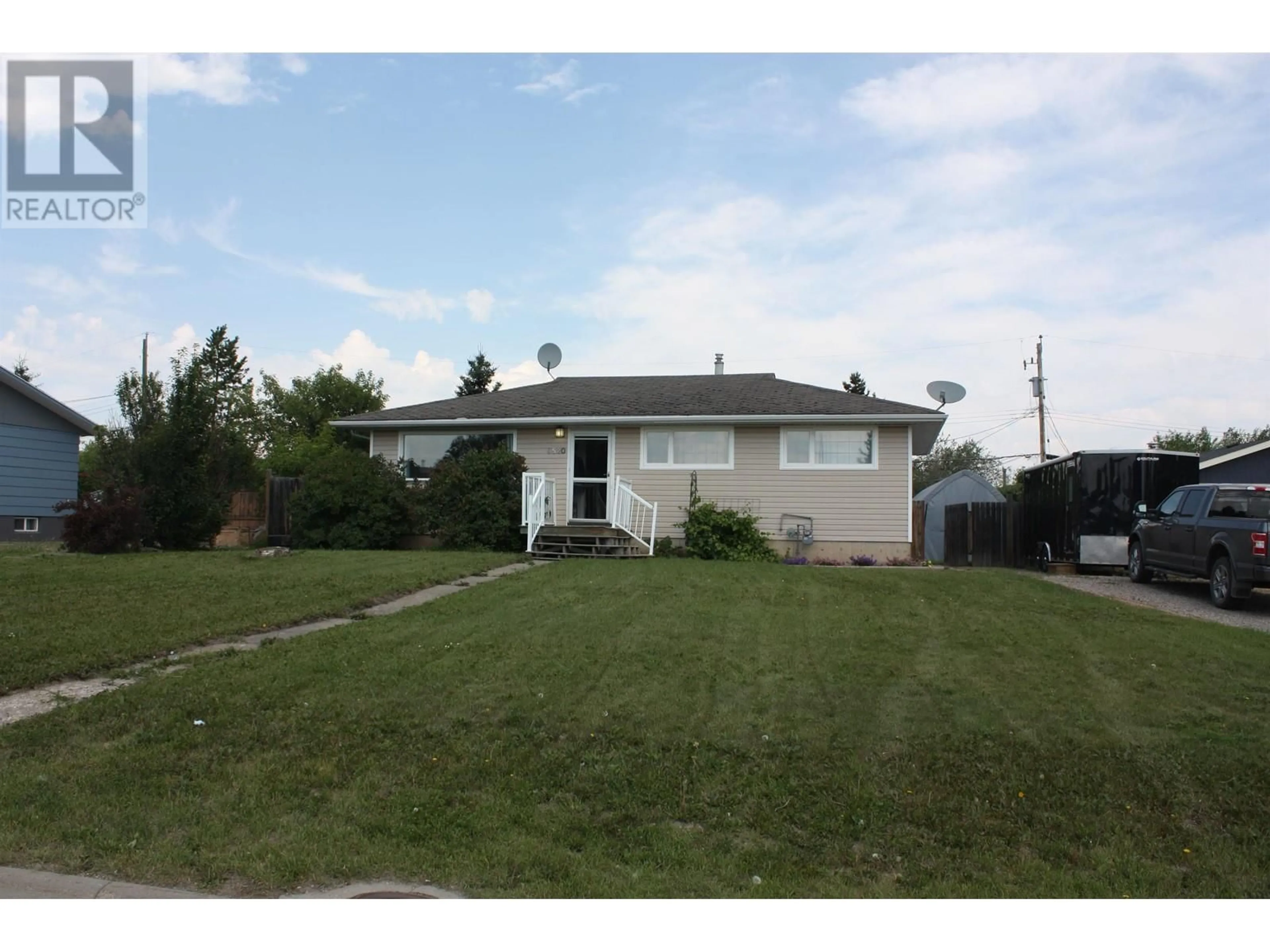 Frontside or backside of a home for 9520 PEACE RIVER ROAD, Fort St. John British Columbia V1J2S5