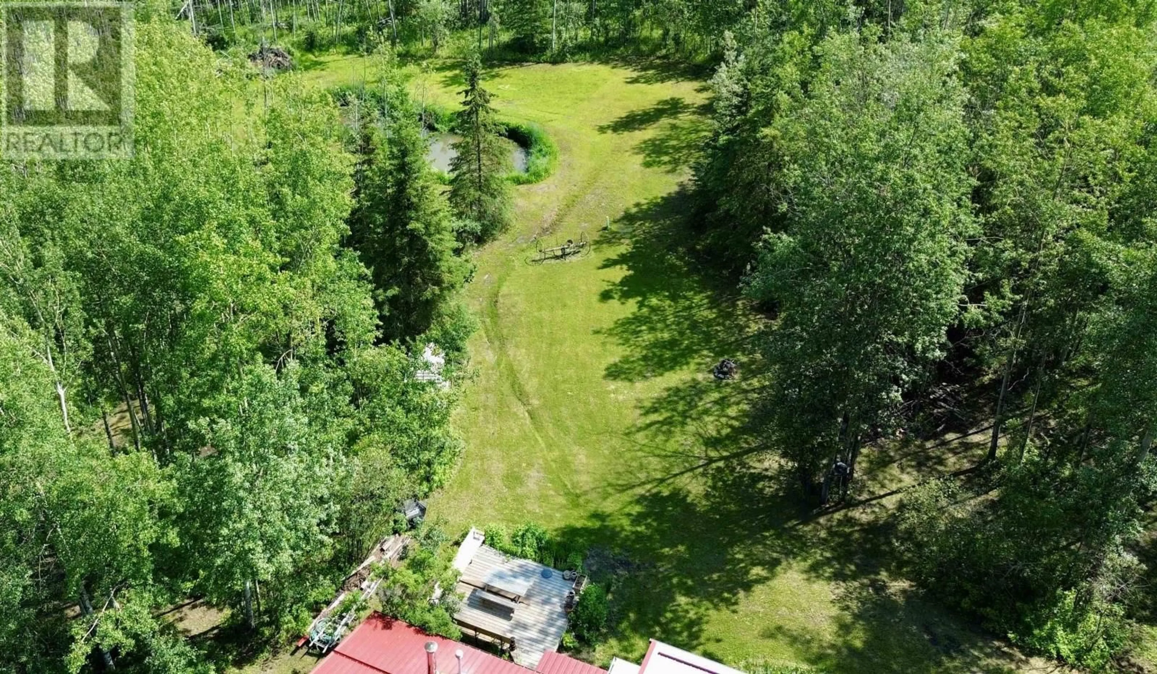 A pic from outside/outdoor area/front of a property/back of a property/a pic from drone, forest/trees view for 14026 273 ROAD, Fort St. John British Columbia V0C1H0