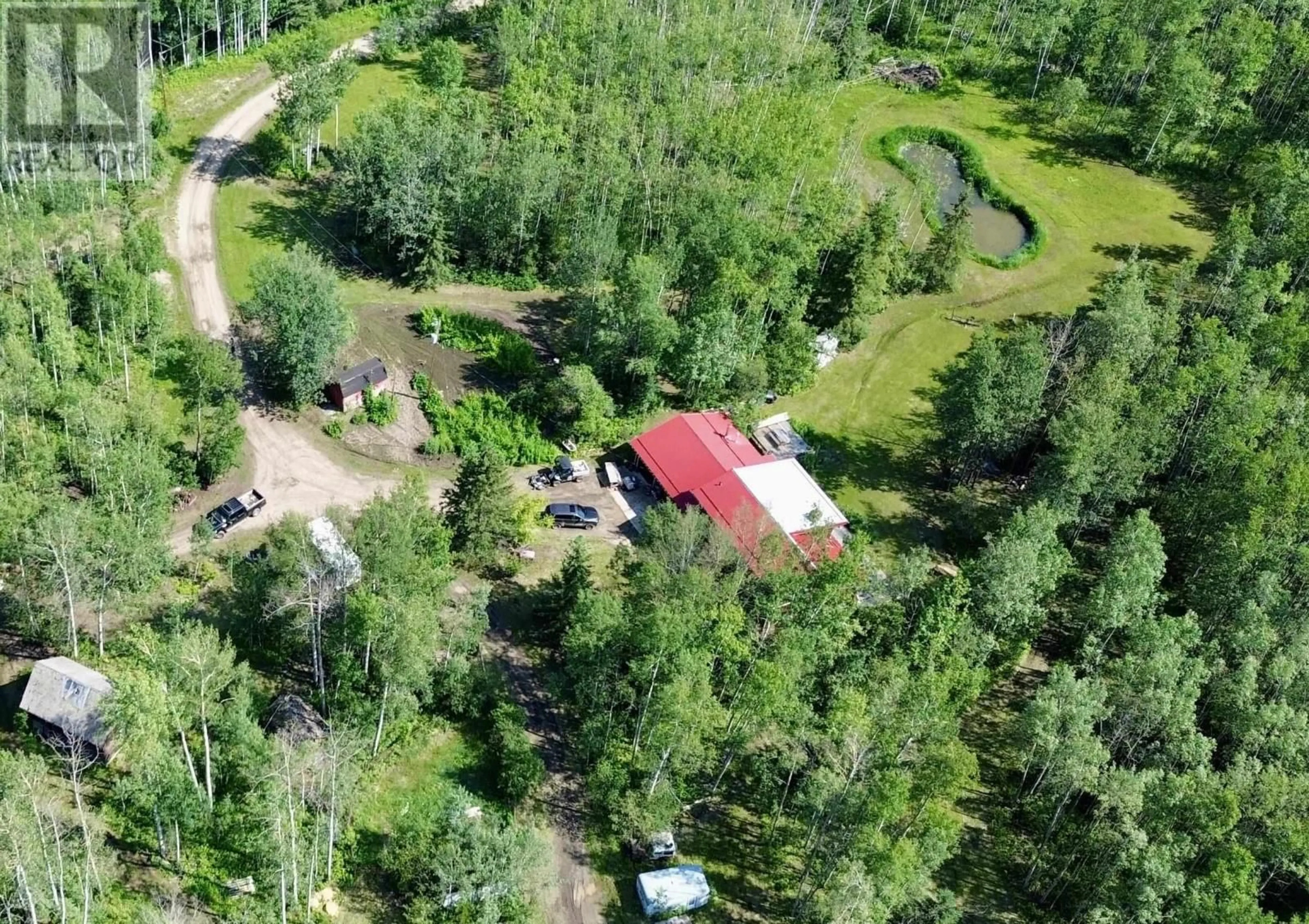 A pic from outside/outdoor area/front of a property/back of a property/a pic from drone, forest/trees view for 14026 273 ROAD, Fort St. John British Columbia V0C1H0