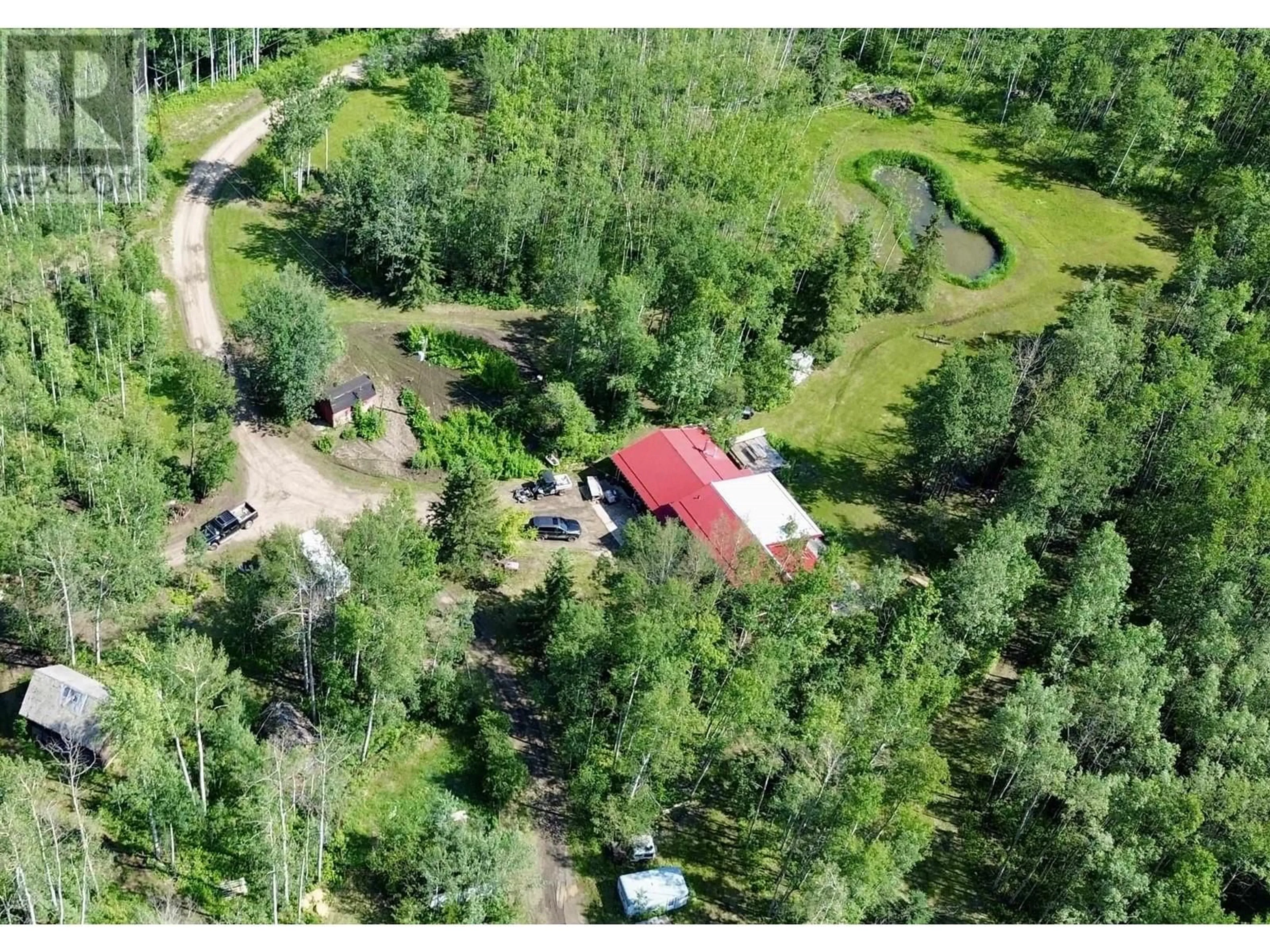 A pic from outside/outdoor area/front of a property/back of a property/a pic from drone, forest/trees view for 14026 273 ROAD, Fort St. John British Columbia V0C1H0