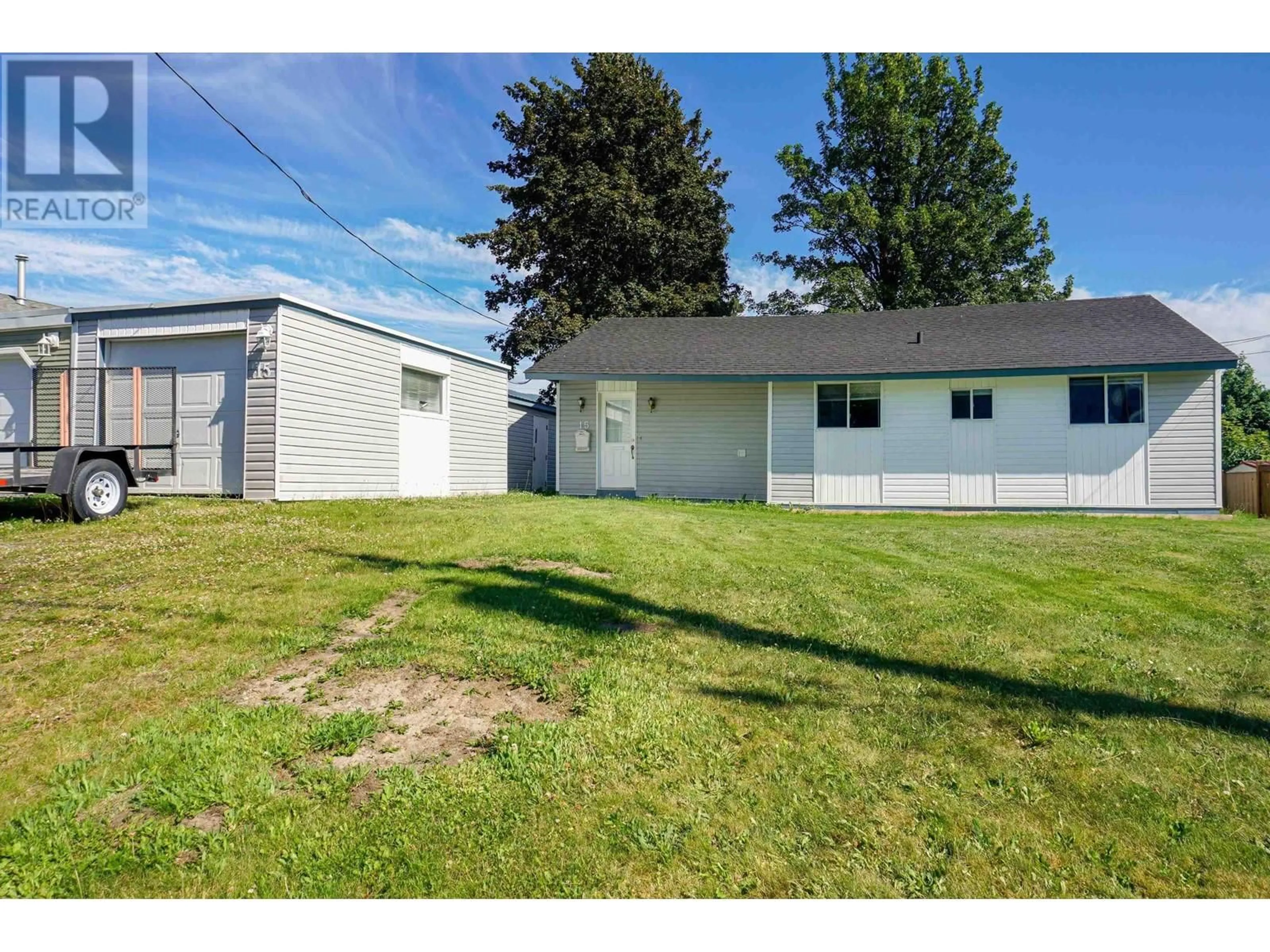 Frontside or backside of a home, the fenced backyard for 15 SAGUENAY STREET, Kitimat British Columbia V8C1W7