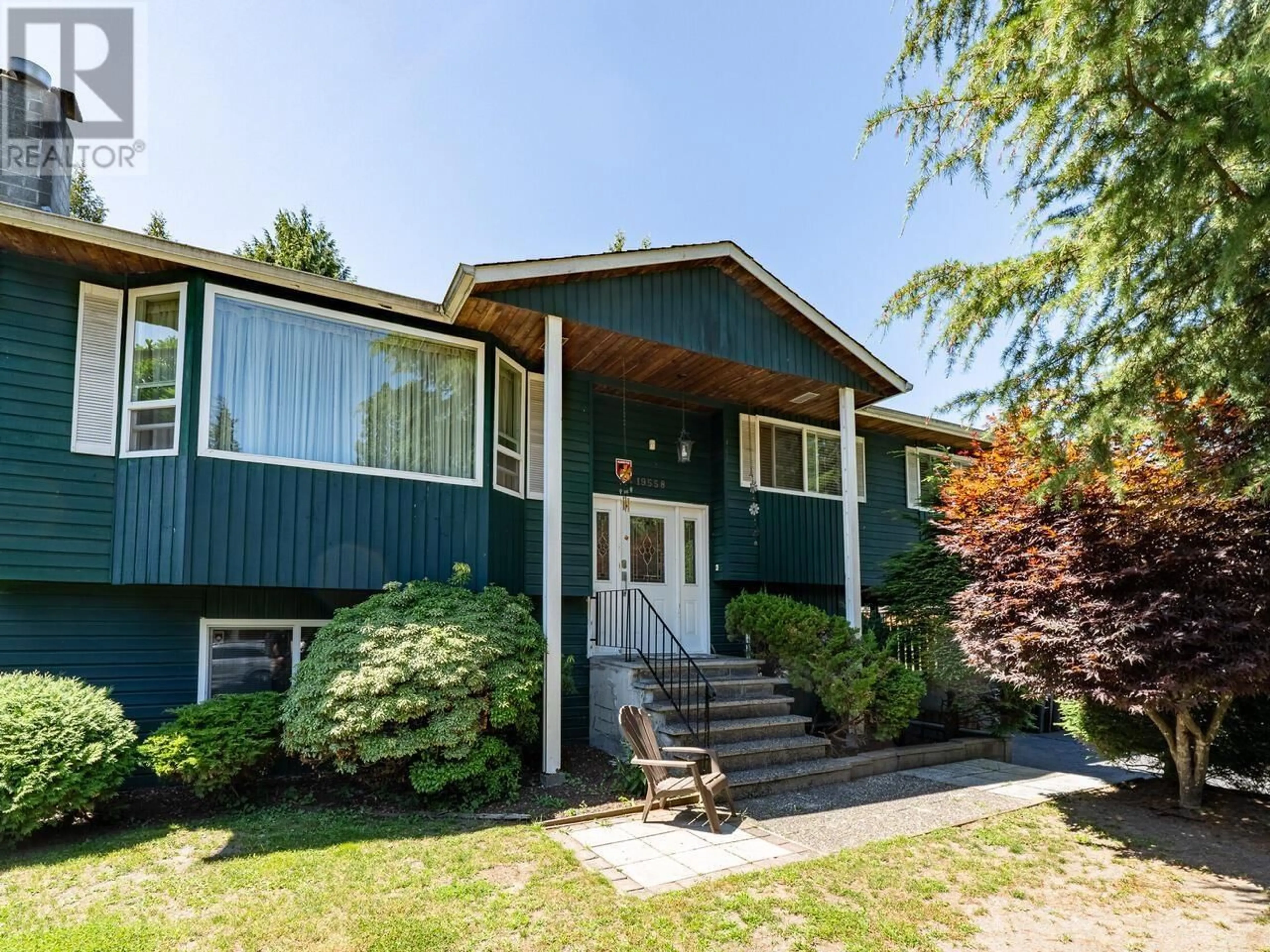 Frontside or backside of a home for 19558 120B AVENUE, Pitt Meadows British Columbia V3Y1K8