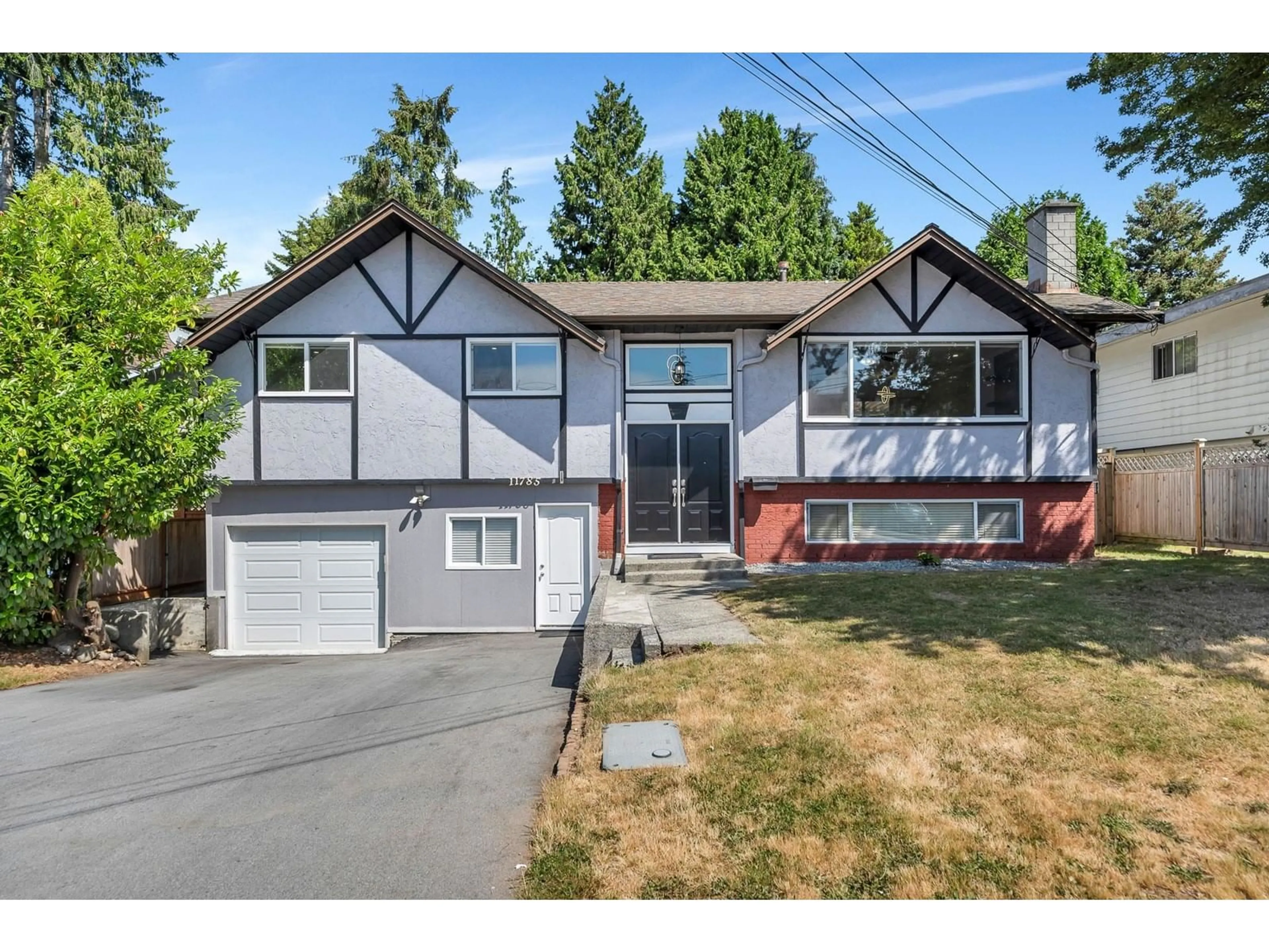 Frontside or backside of a home for 11785 74B AVENUE, Delta British Columbia V4C1H1