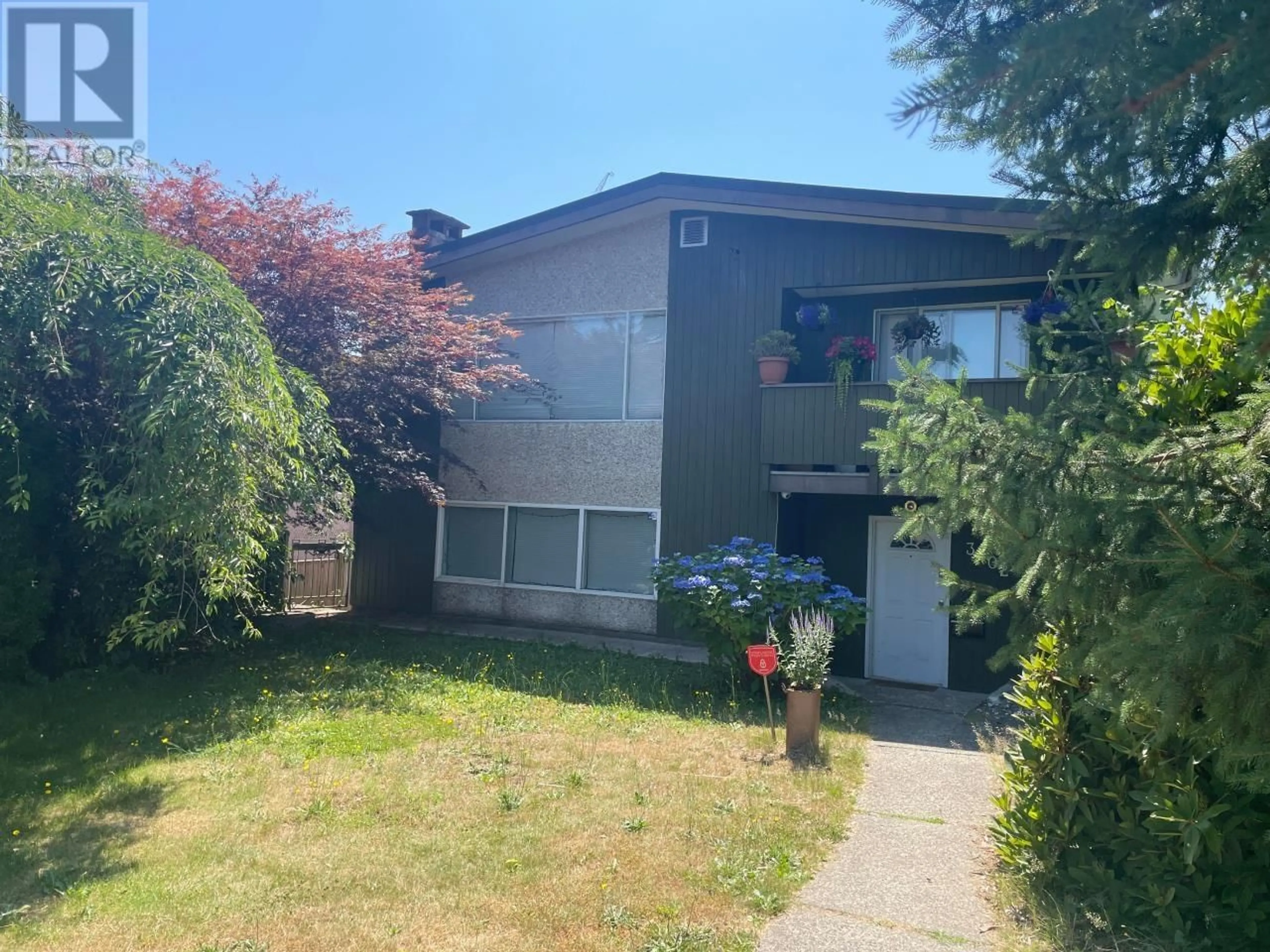 Frontside or backside of a home for 3402 PRICE STREET, Vancouver British Columbia V5R5R1