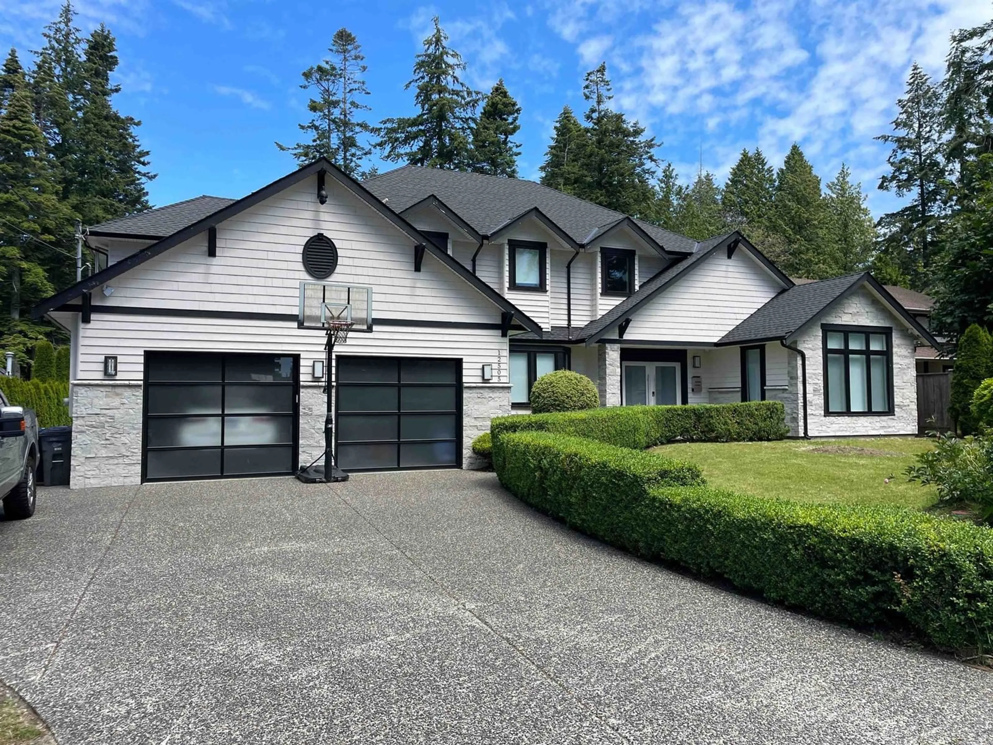 Frontside or backside of a home, cottage for 12505 22 AVENUE, Surrey British Columbia V4A2B6