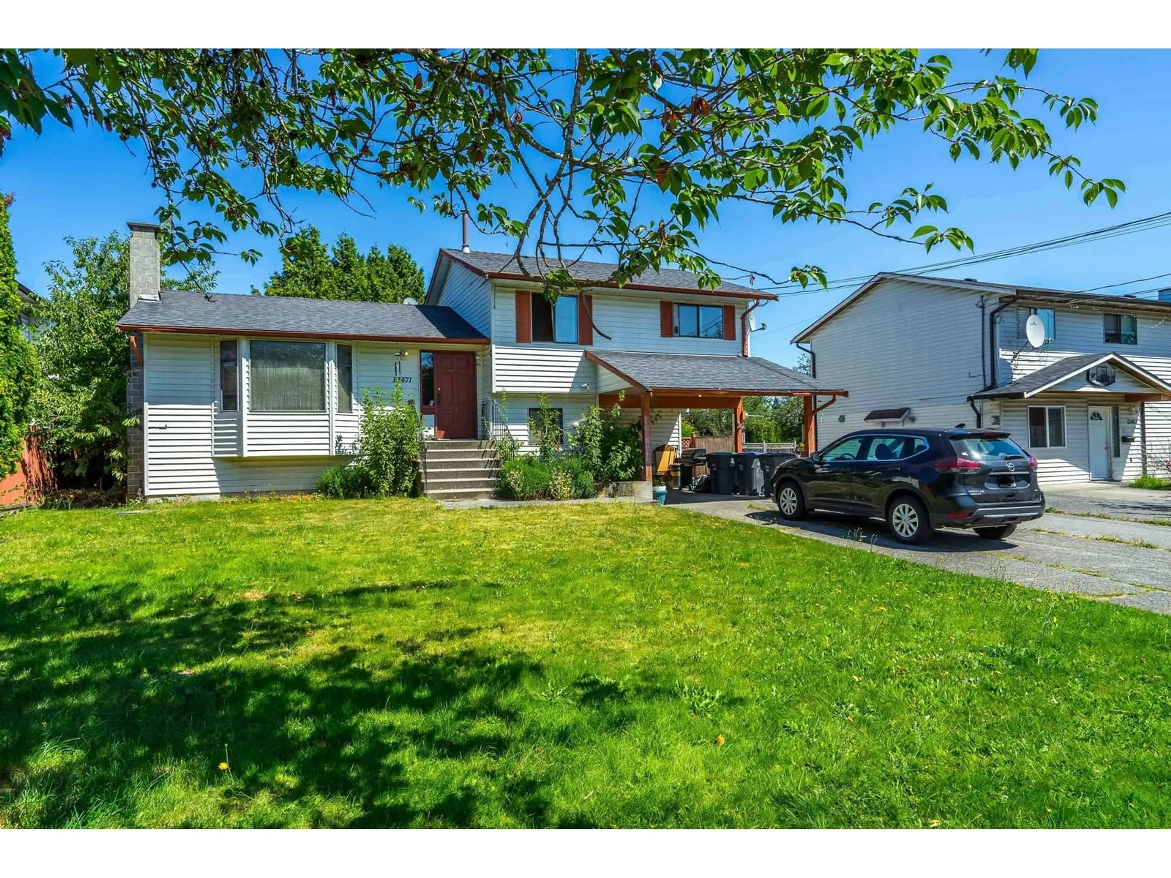 Frontside or backside of a home for 13471 67 AVENUE, Surrey British Columbia V3W8J8