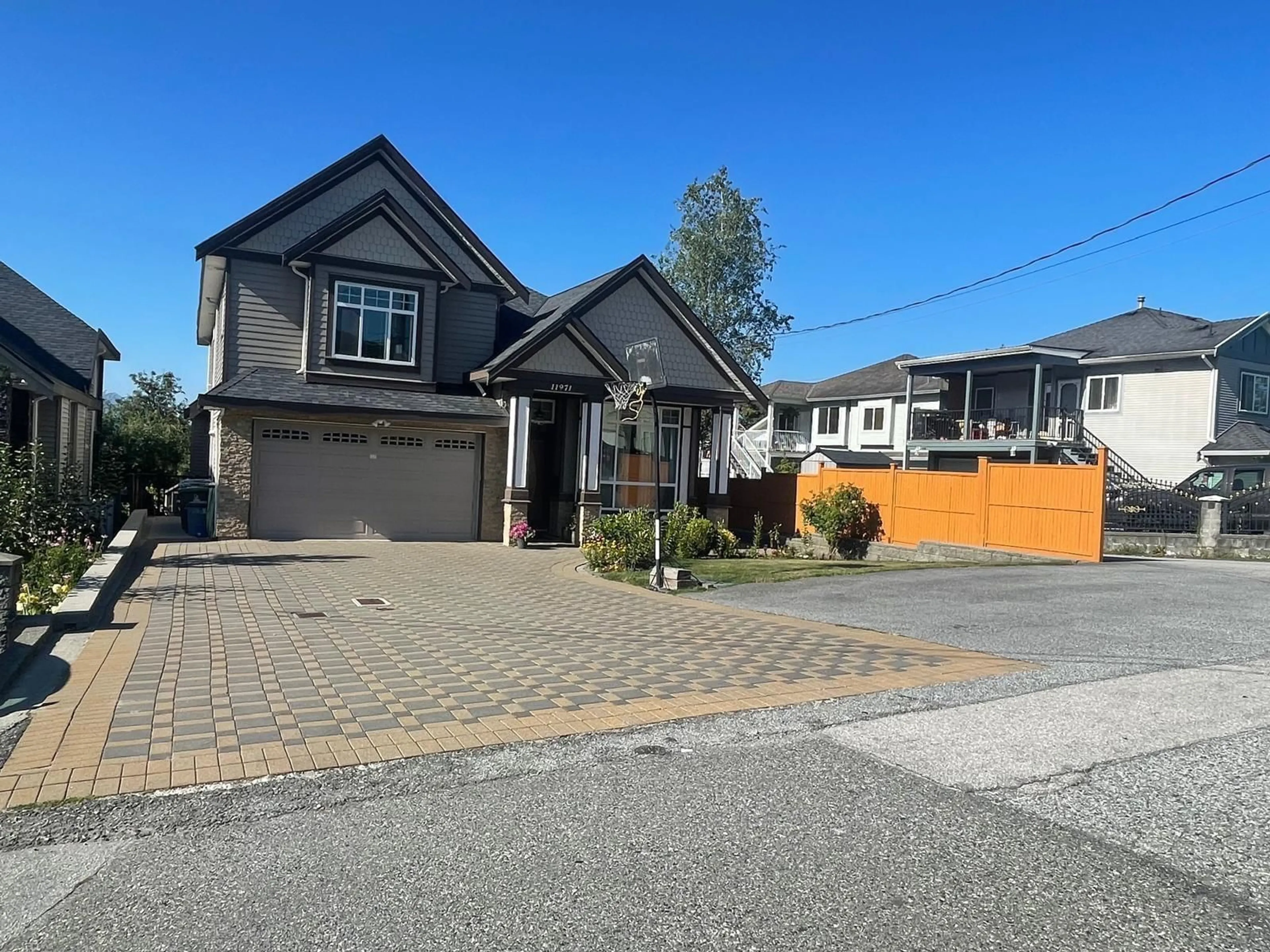 Frontside or backside of a home for 11971 97 AVENUE, Surrey British Columbia V3V2C4