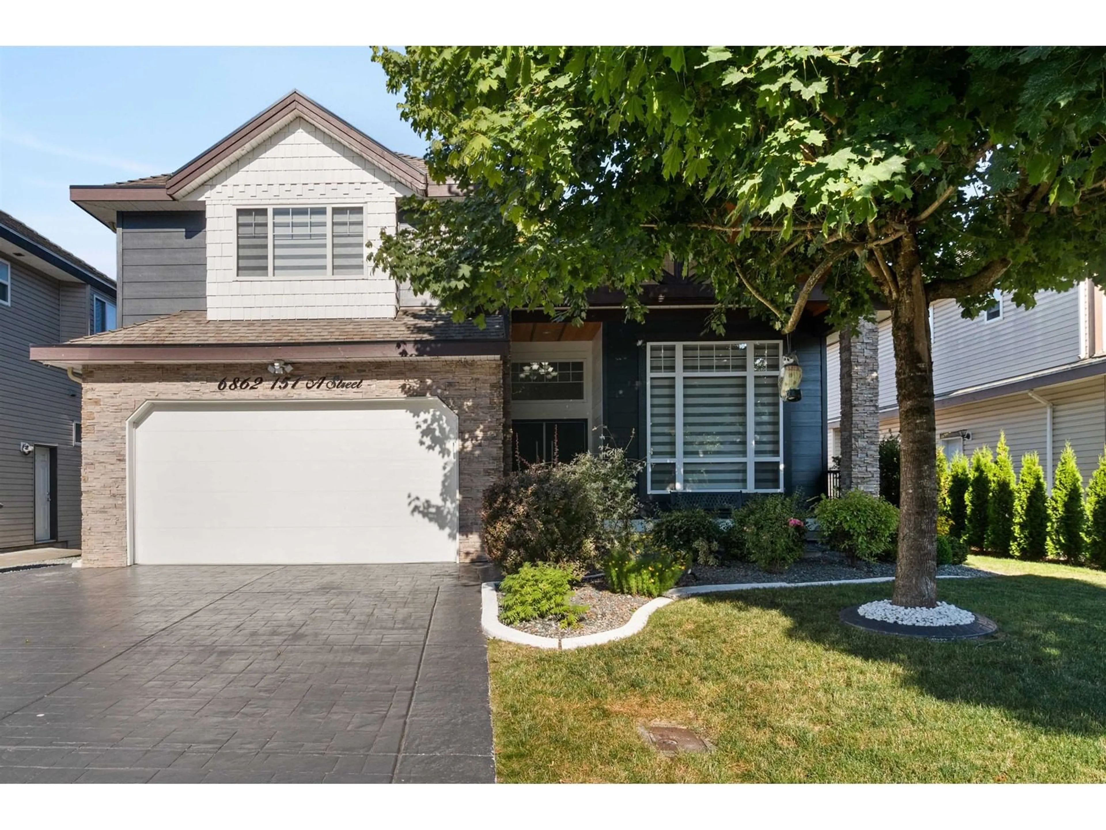 Frontside or backside of a home for 6862 151A STREET, Surrey British Columbia V3S7Y7