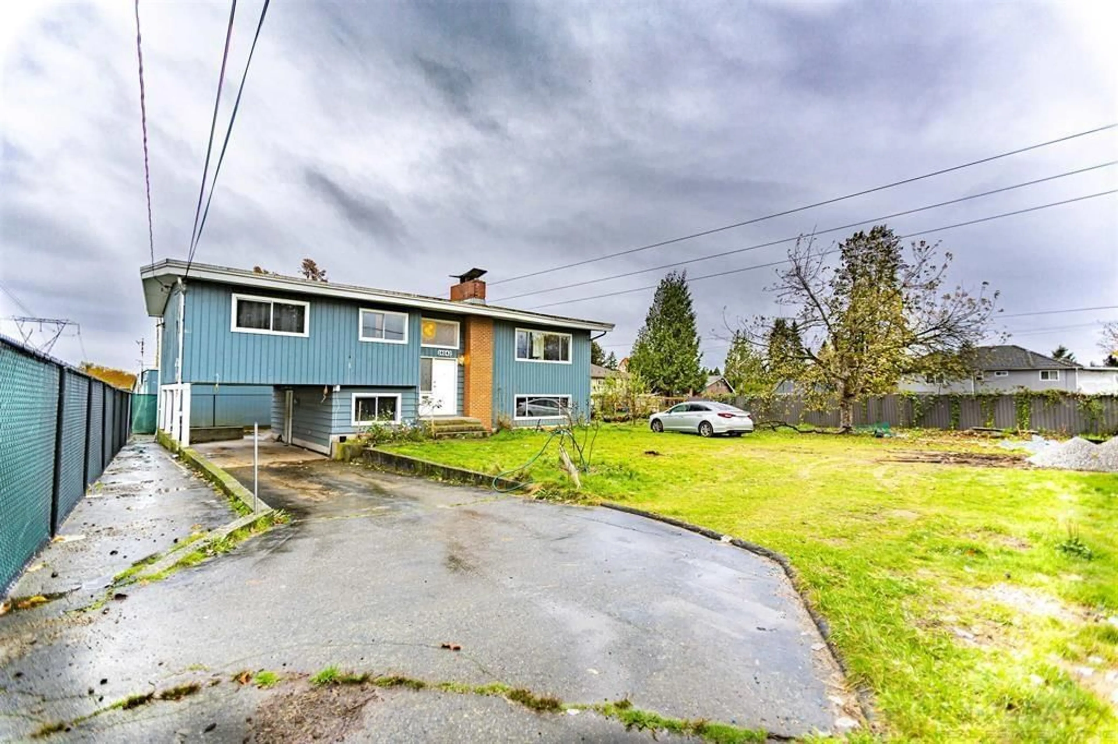 Frontside or backside of a home for 14042 110 AVENUE, Surrey British Columbia V3R1Z2