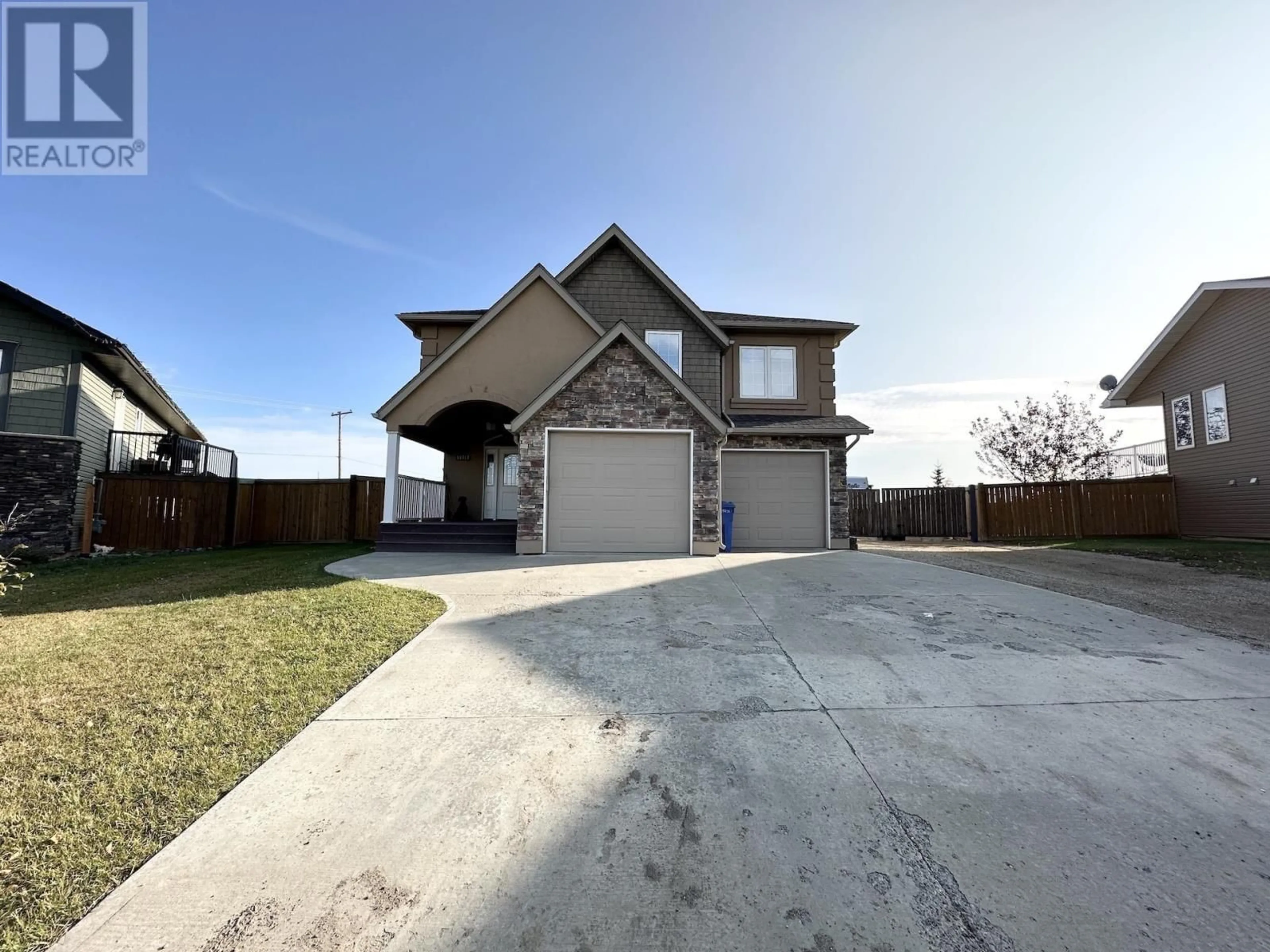 Frontside or backside of a home for 11727 88 STREET, Fort St. John British Columbia V1J0H8