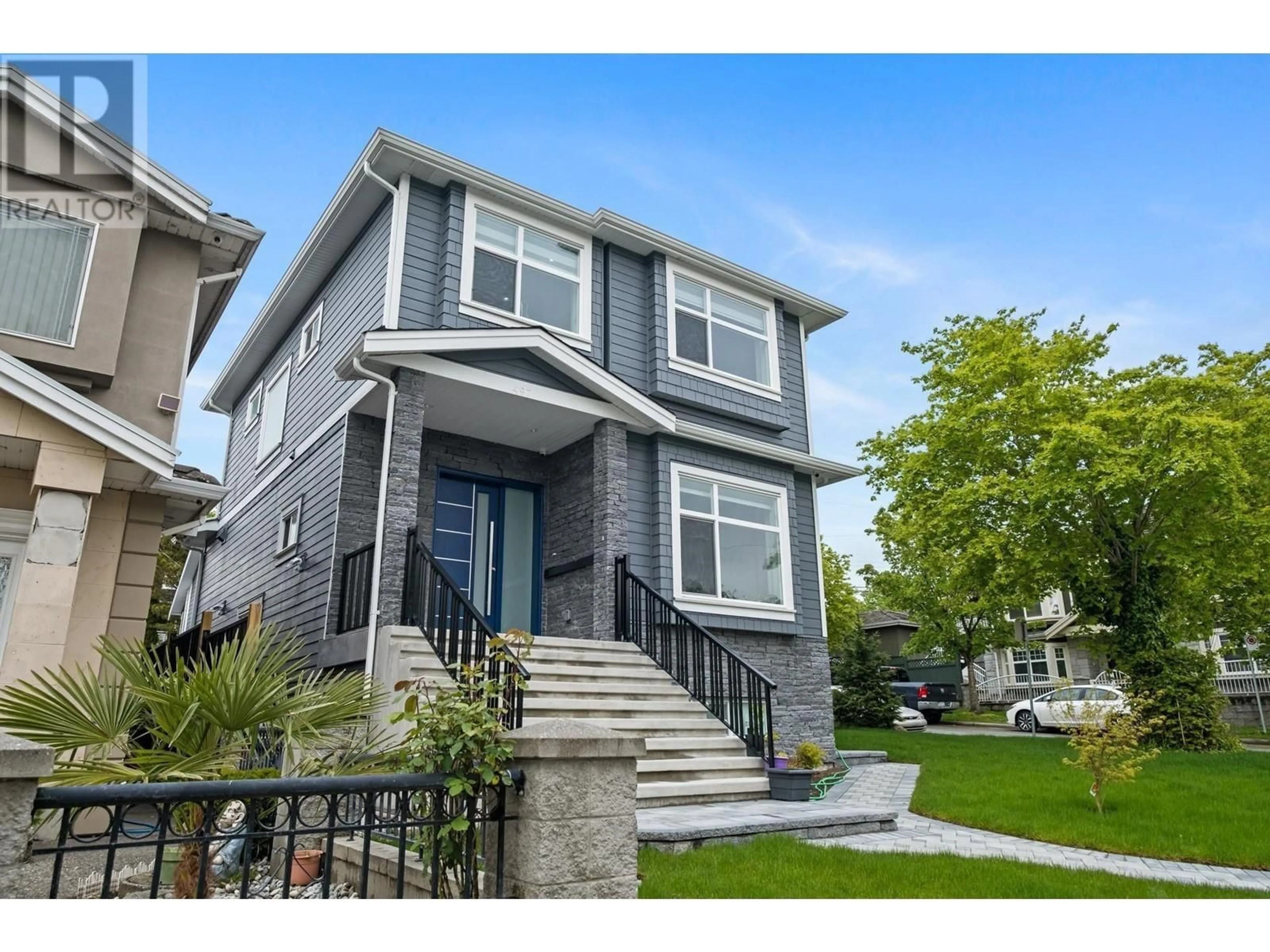 Frontside or backside of a home for 497 E 61ST AVENUE, Vancouver British Columbia V5X2B7