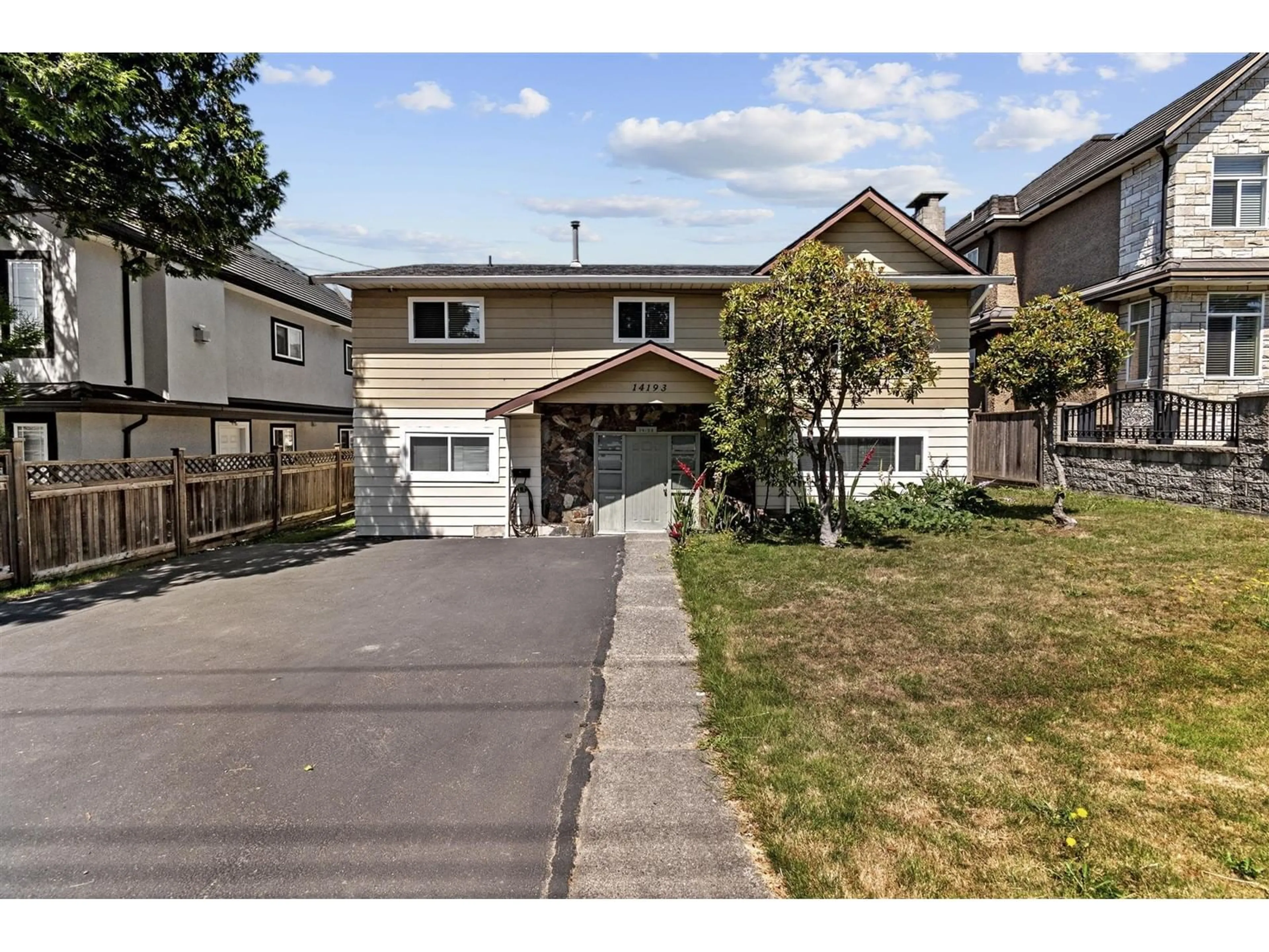 Frontside or backside of a home for 14193 72 AVENUE, Surrey British Columbia V3W2P9