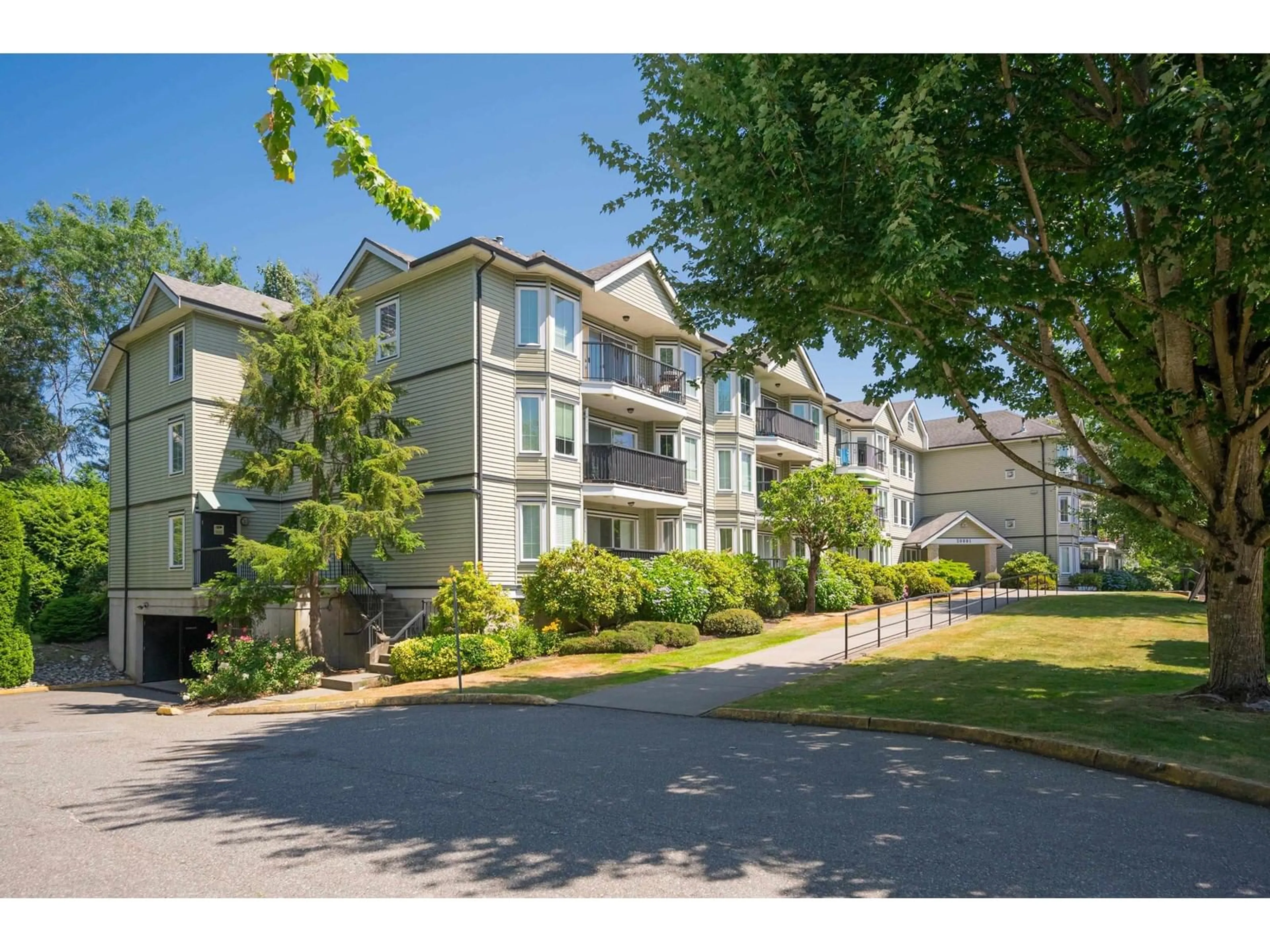 A pic from exterior of the house or condo for 101 20881 56 AVENUE, Langley British Columbia V3A3Z3