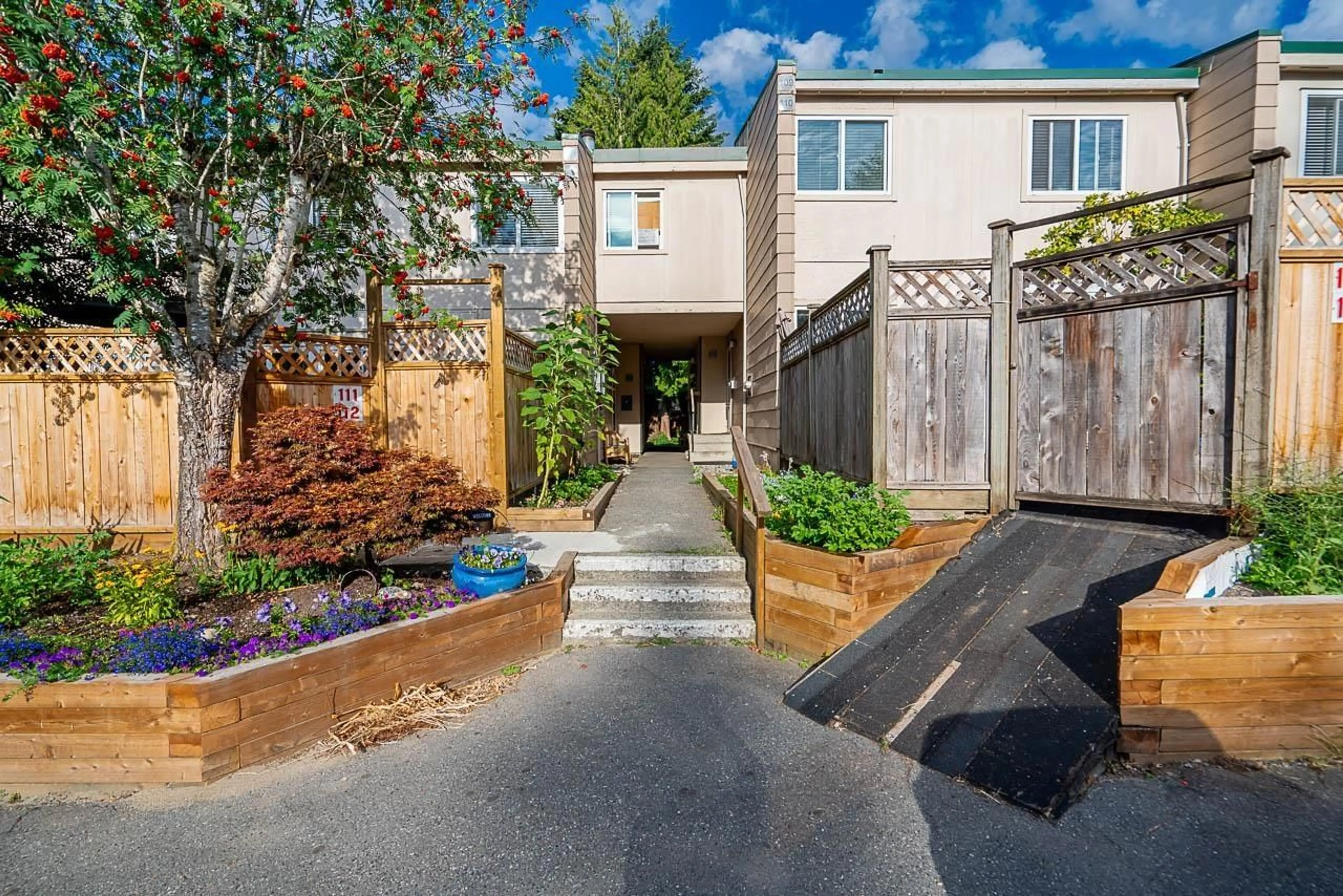 A pic from exterior of the house or condo for 110 15245 105 AVENUE, Surrey British Columbia V3R1R9