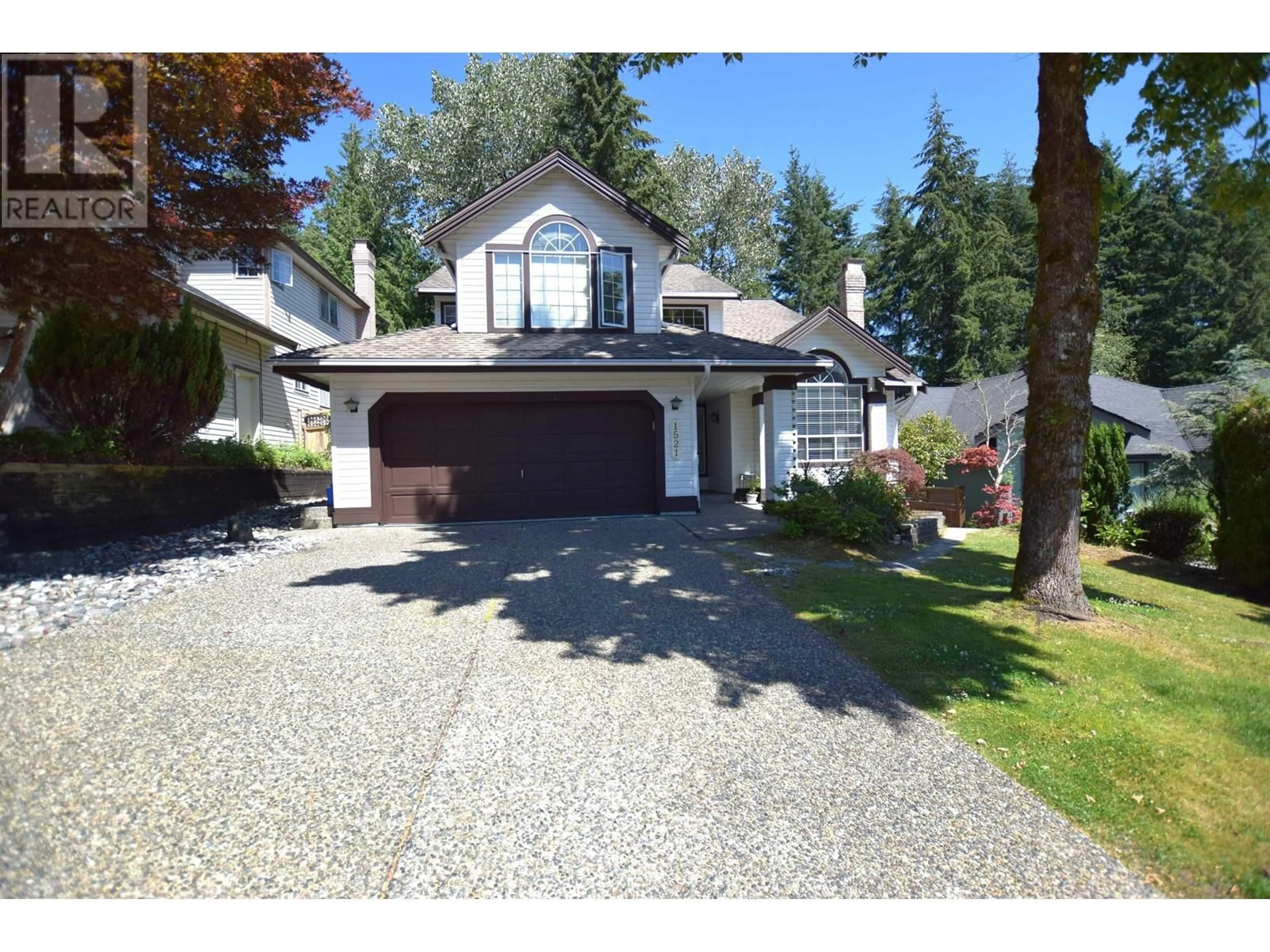 Frontside or backside of a home for 1521 BRAMBLE LANE, Coquitlam British Columbia V3E2S7