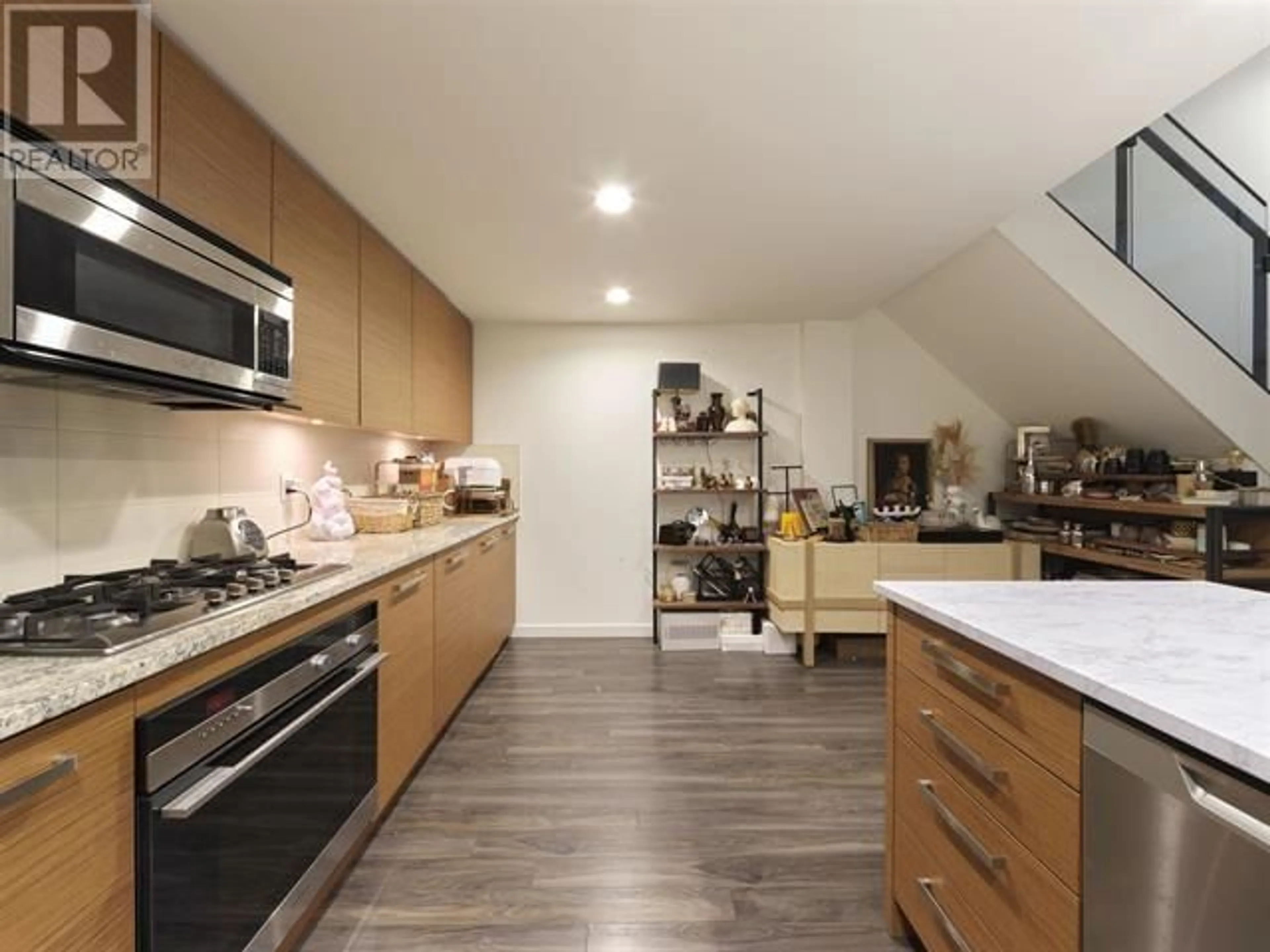 Open concept kitchen for 102 6311 CAMBIE STREET, Vancouver British Columbia V5Z3B2