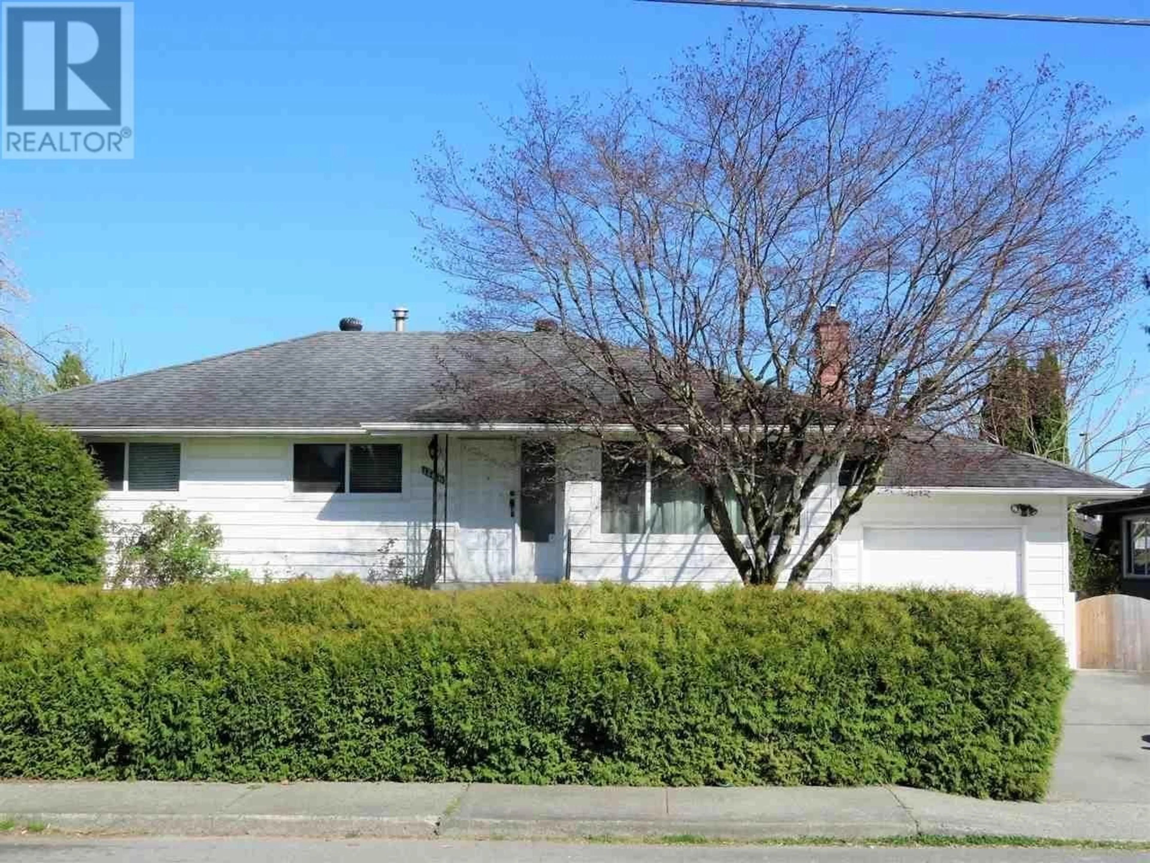 Frontside or backside of a home, the street view for 12116 220 STREET, Maple Ridge British Columbia V2X5R5