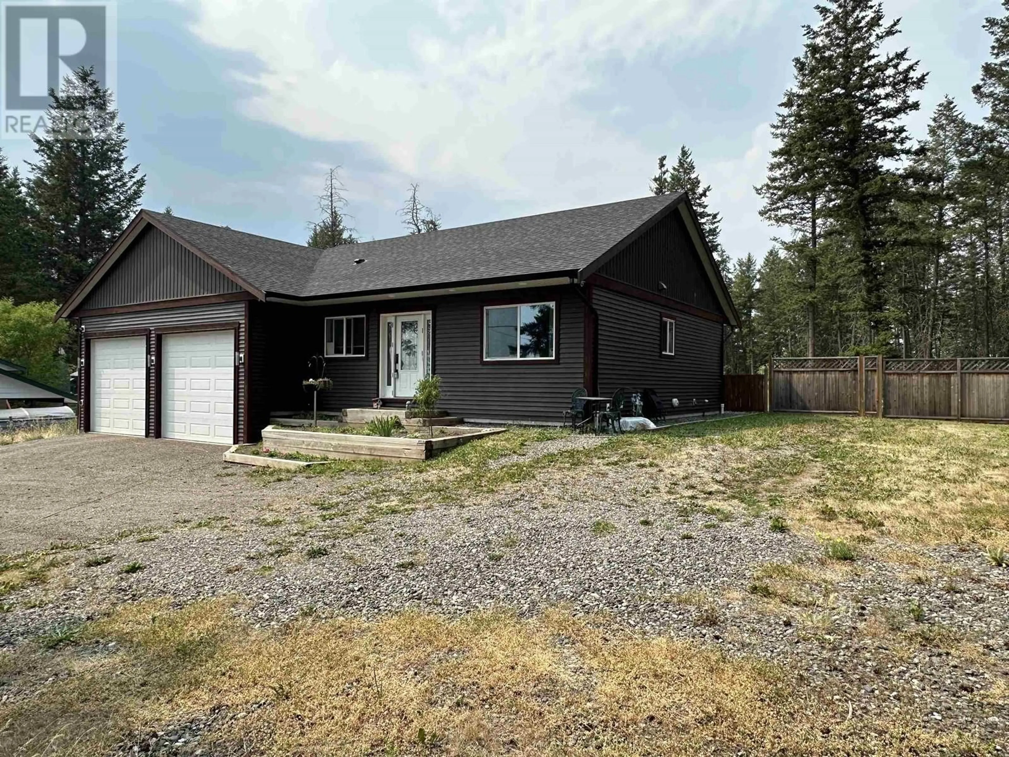 Frontside or backside of a home for 5069 BLOCK DRIVE, 108 Mile Ranch British Columbia V0K2Z0