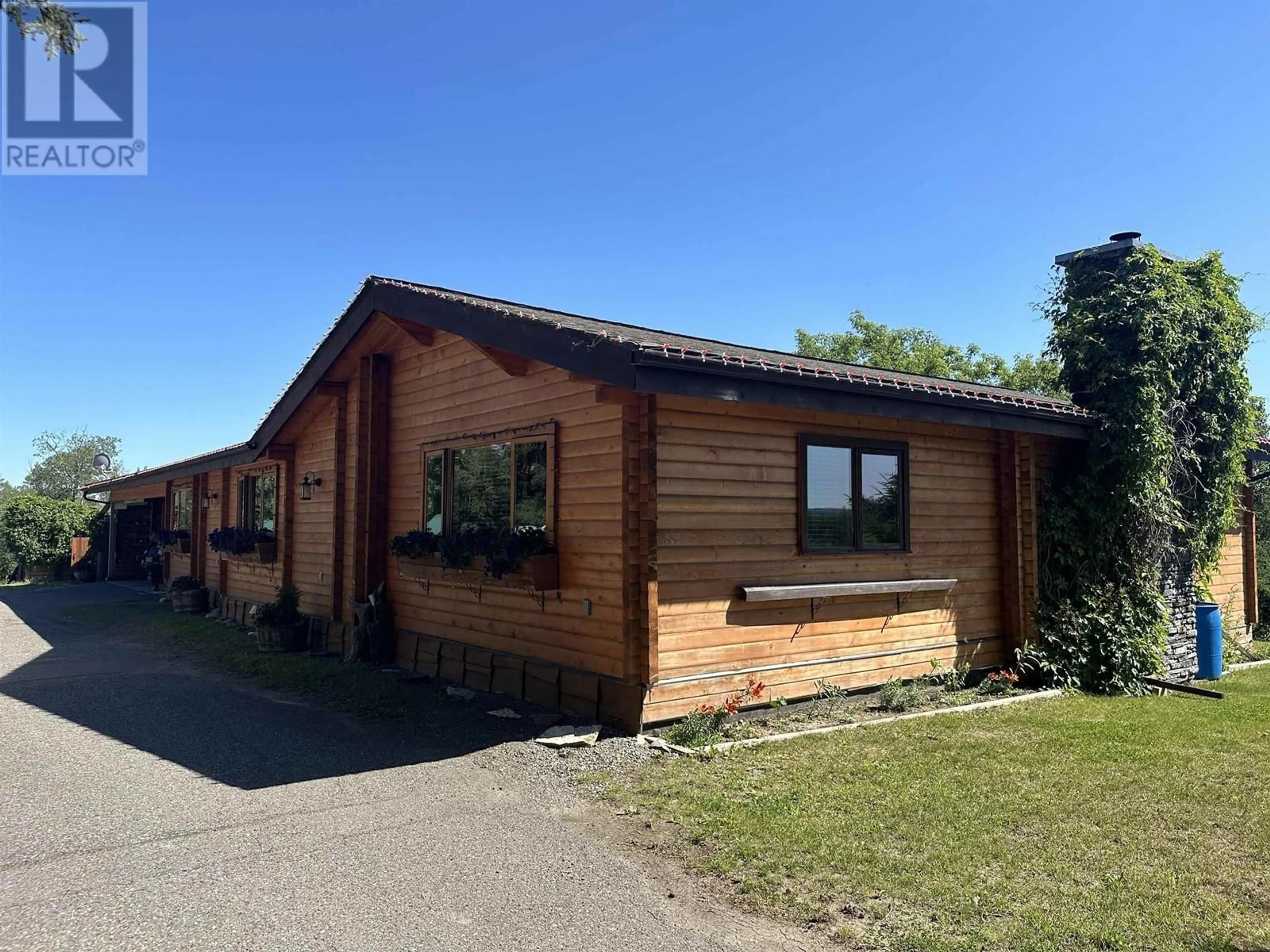 A pic from outside/outdoor area/front of a property/back of a property/a pic from drone, building for 282 NORTHSIDE ROAD, Vanderhoof British Columbia V0J3A2