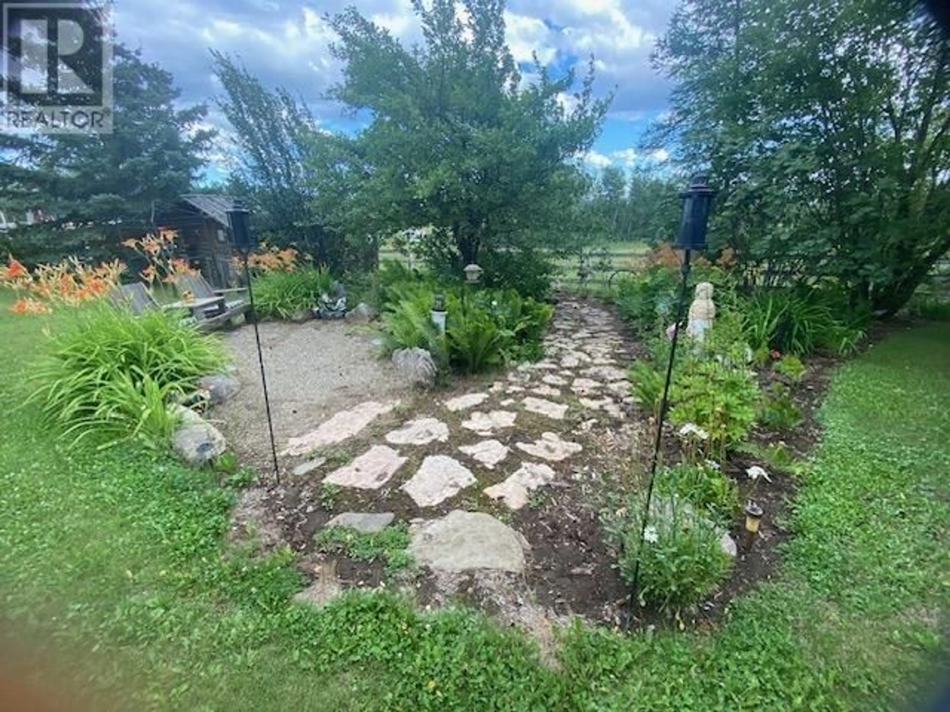 Patio, the fenced backyard for 12213 PACIFIC AVENUE, Fort St. John British Columbia V1J8A5