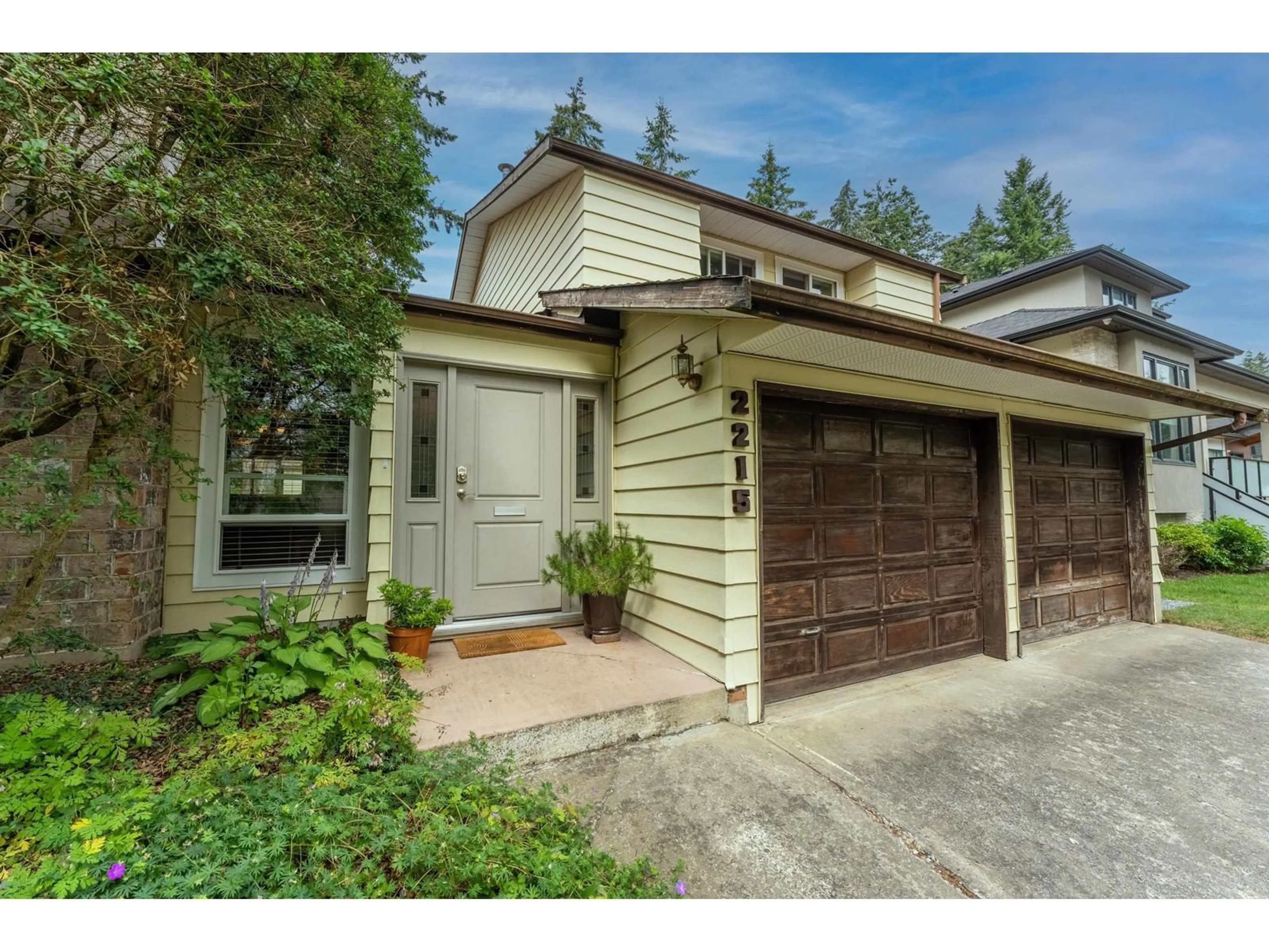 Frontside or backside of a home for 2215 153A STREET, Surrey British Columbia V4A4R4