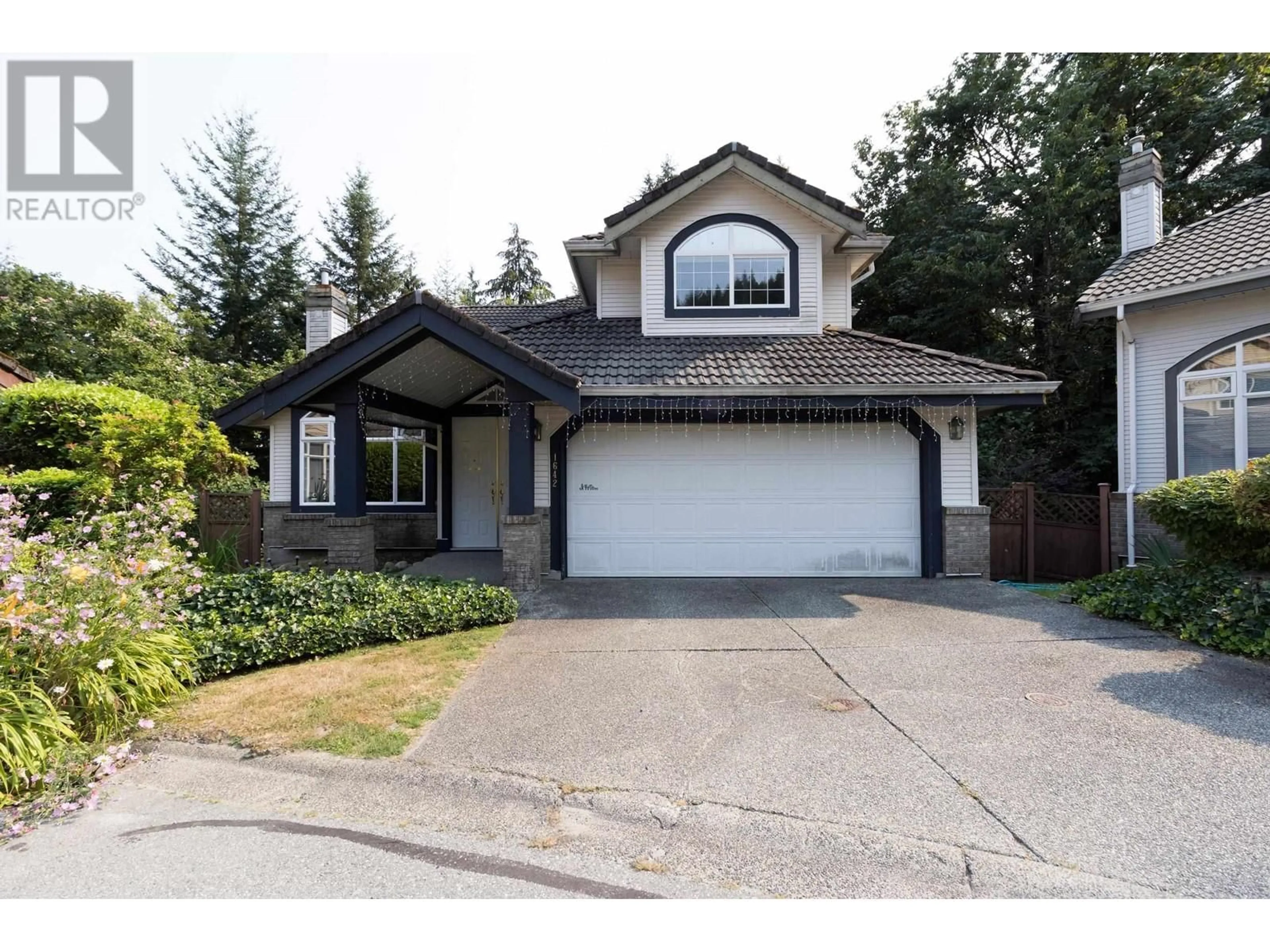 Frontside or backside of a home for 1642 PLATEAU CRESCENT, Coquitlam British Columbia V3E3B3