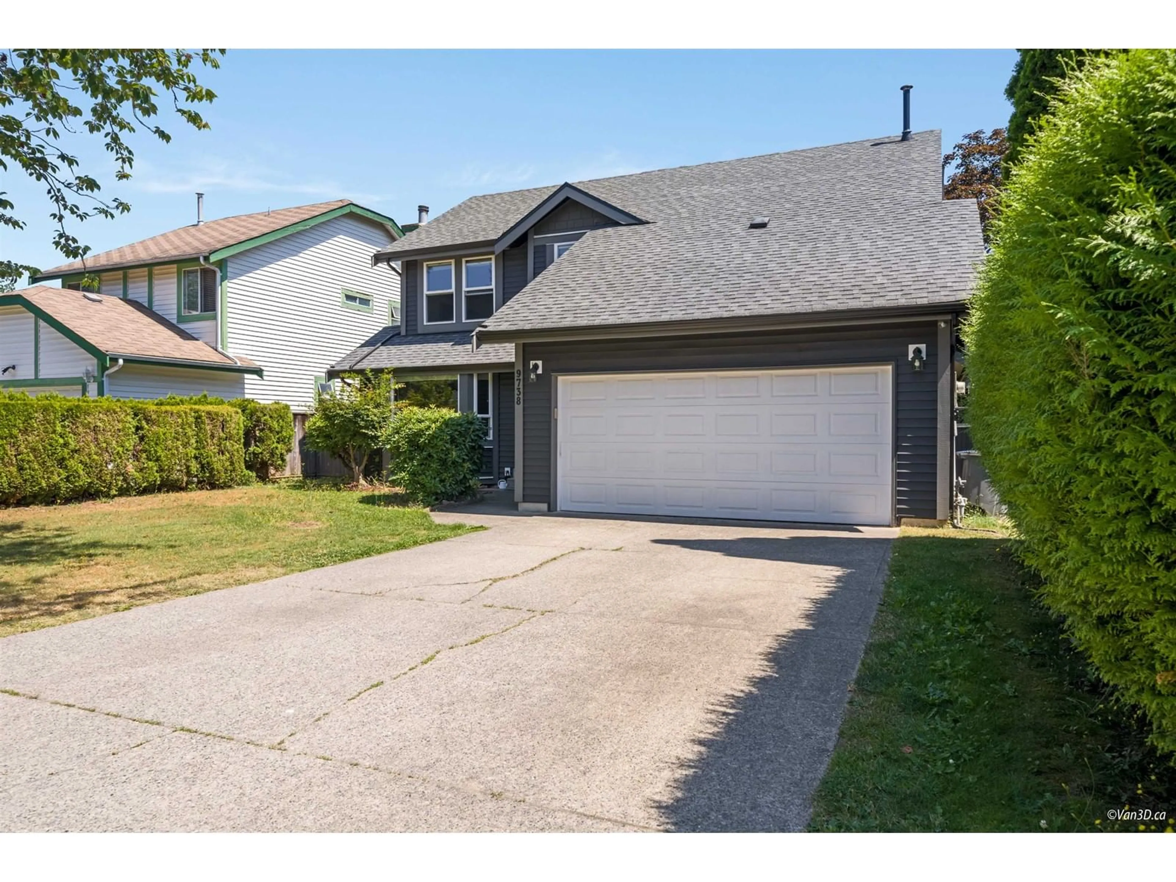Frontside or backside of a home for 9738 151 STREET, Surrey British Columbia V3R8W7