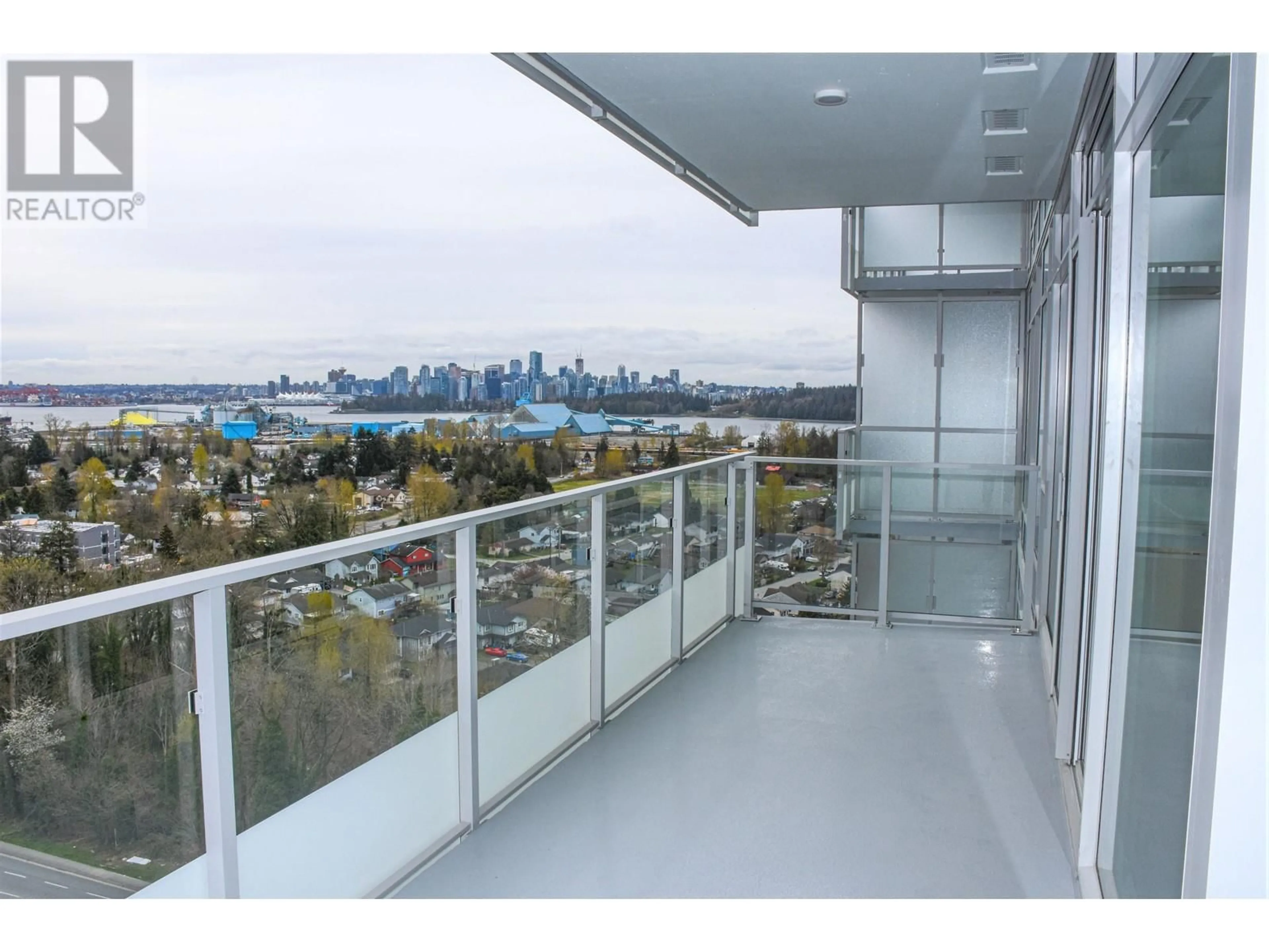 A pic from exterior of the house or condo, the view of city buildings for 1702 200 KLAHANIE COURT, West Vancouver British Columbia V7P0E4