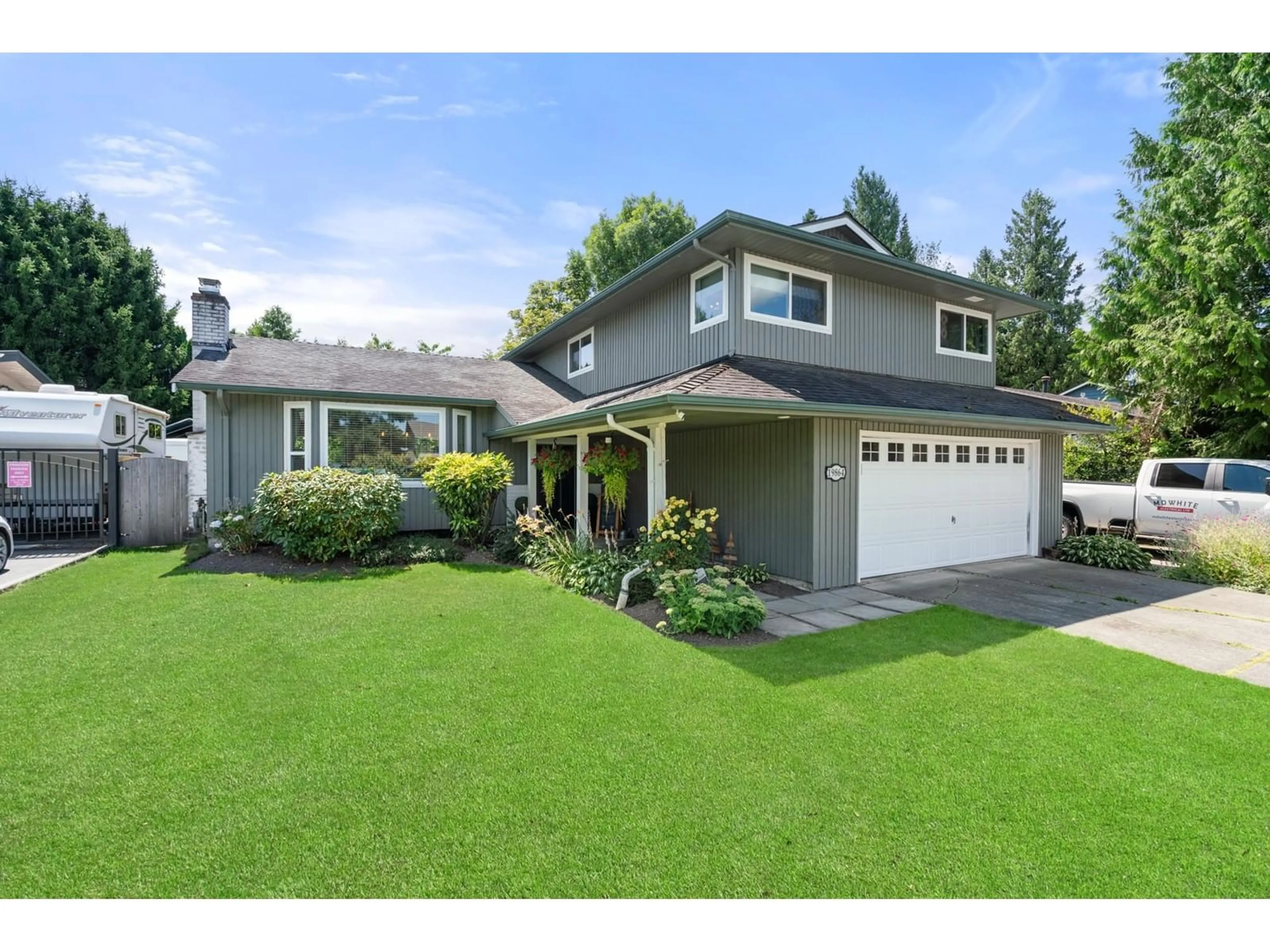 Frontside or backside of a home for 19864 48A AVENUE, Langley British Columbia V3A6Y2