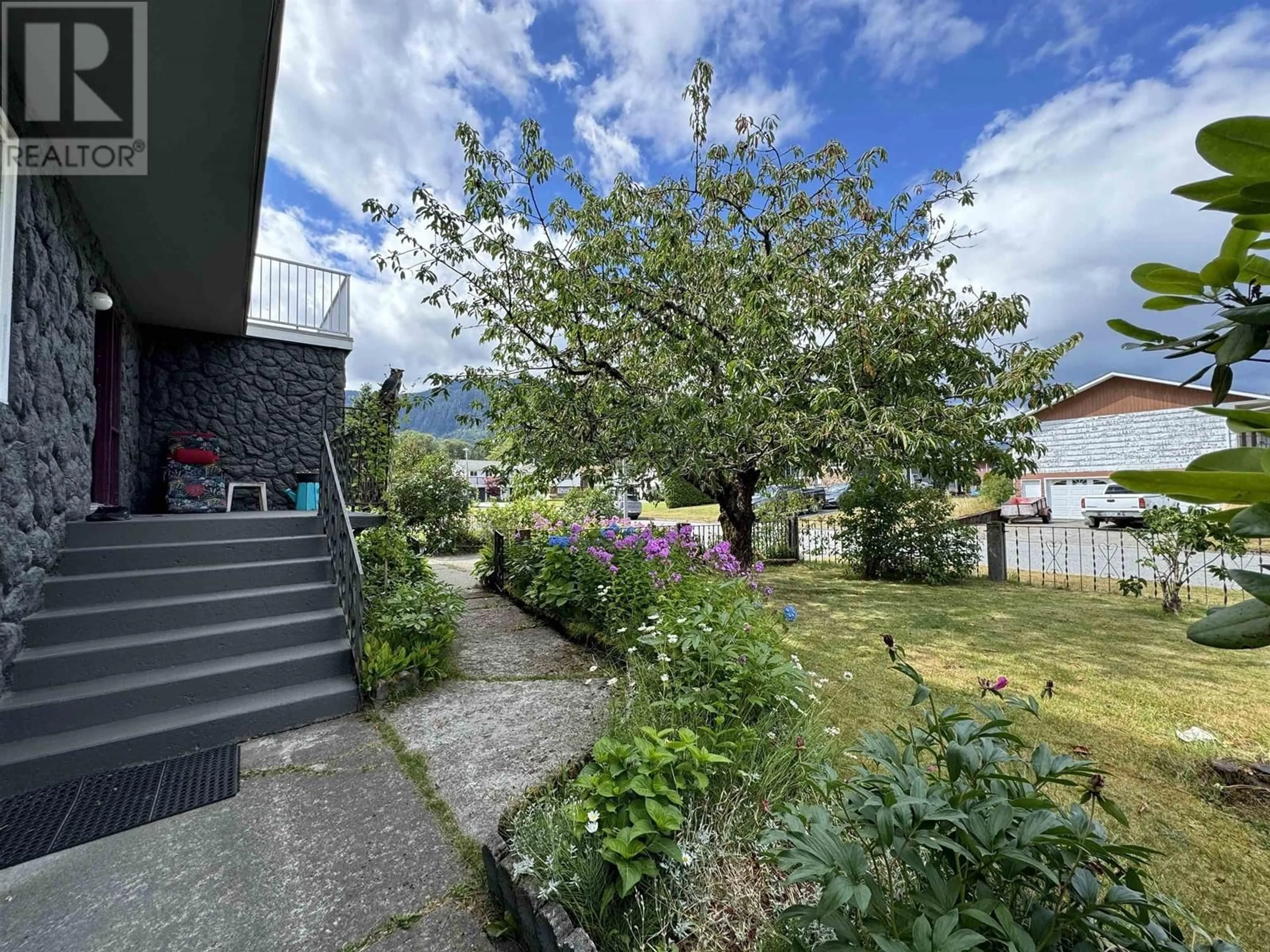 Frontside or backside of a home, the fenced backyard for 41 DEASE STREET, Kitimat British Columbia V8C2M2