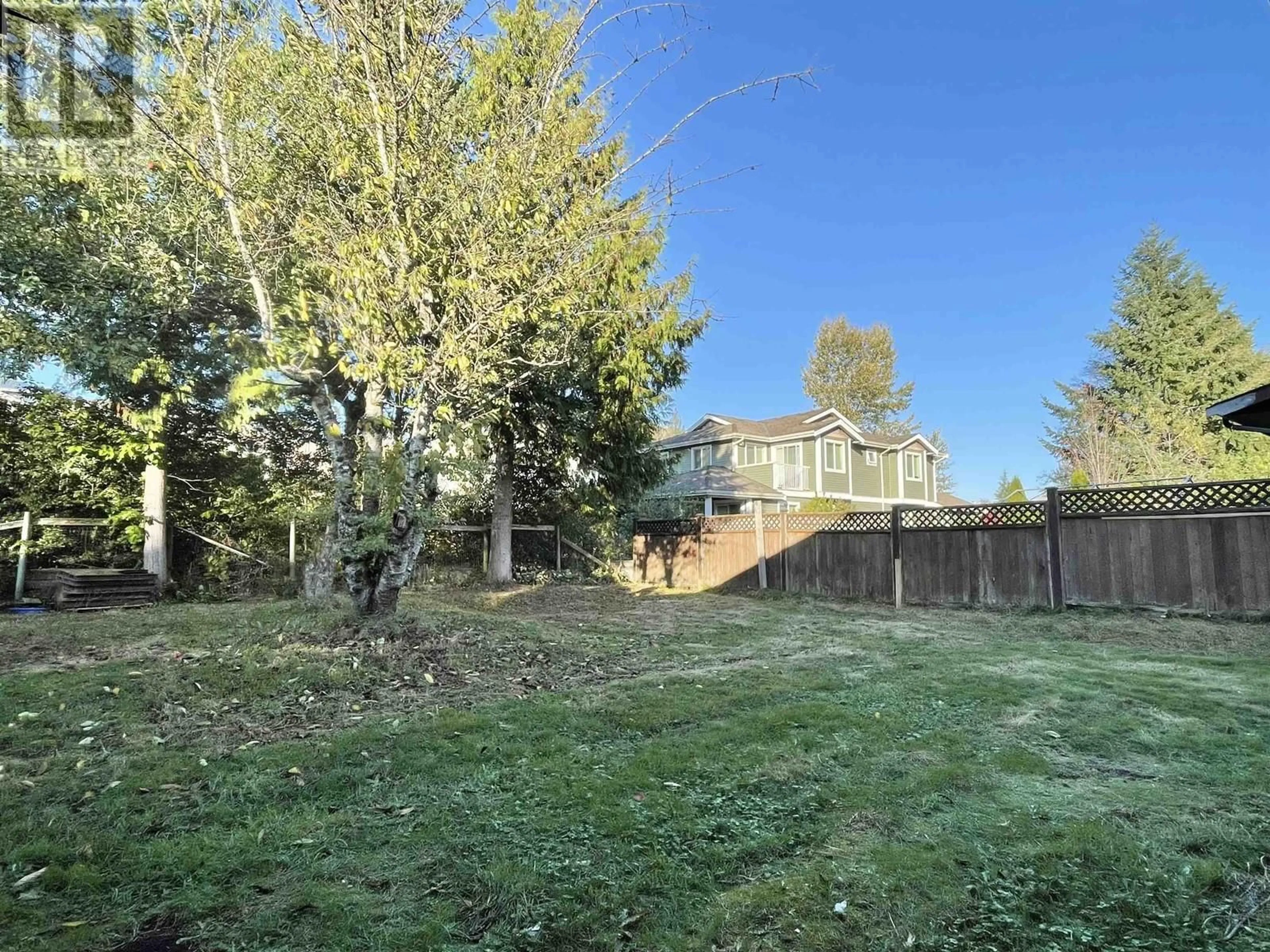 Frontside or backside of a home, the fenced backyard for 866 POPLAR LANE, Gibsons British Columbia V0N1V8