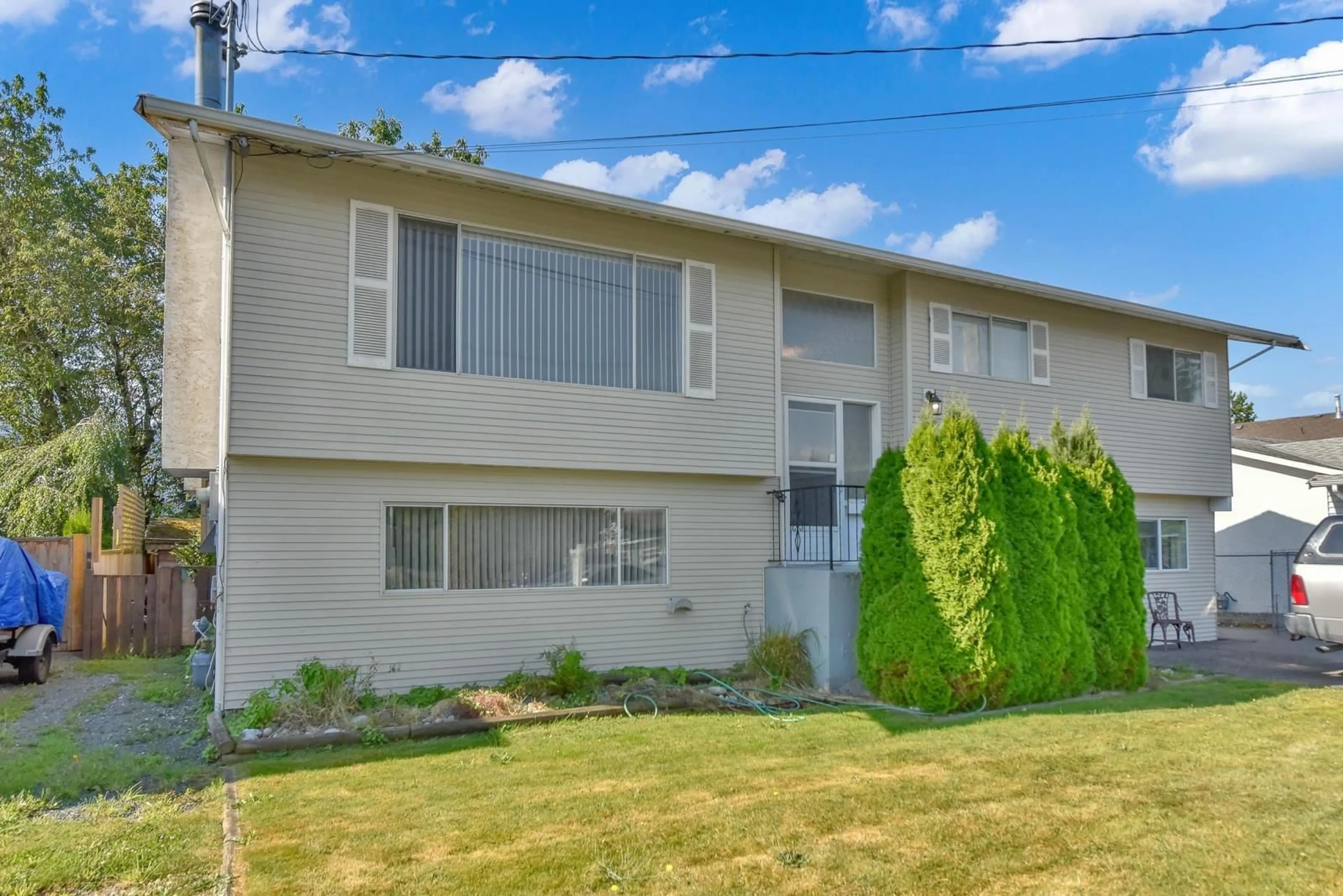 A pic from exterior of the house or condo, the fenced backyard for 45580 STEVENSON ROAD, Chilliwack British Columbia V2R1M6