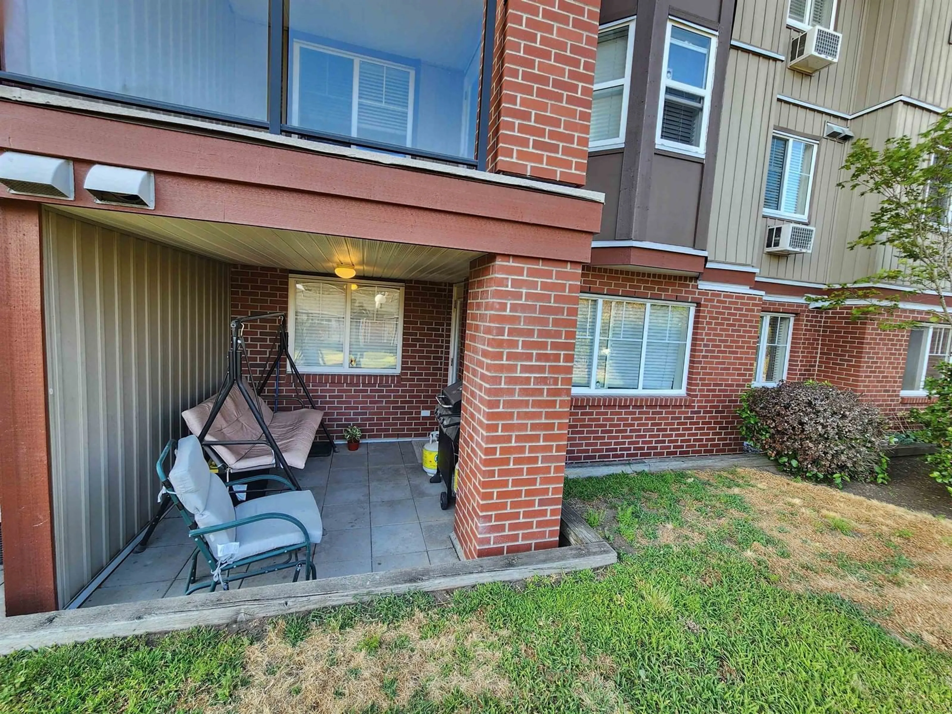 A pic from exterior of the house or condo for 111 19774 56 AVENUE, Langley British Columbia V3A3X6