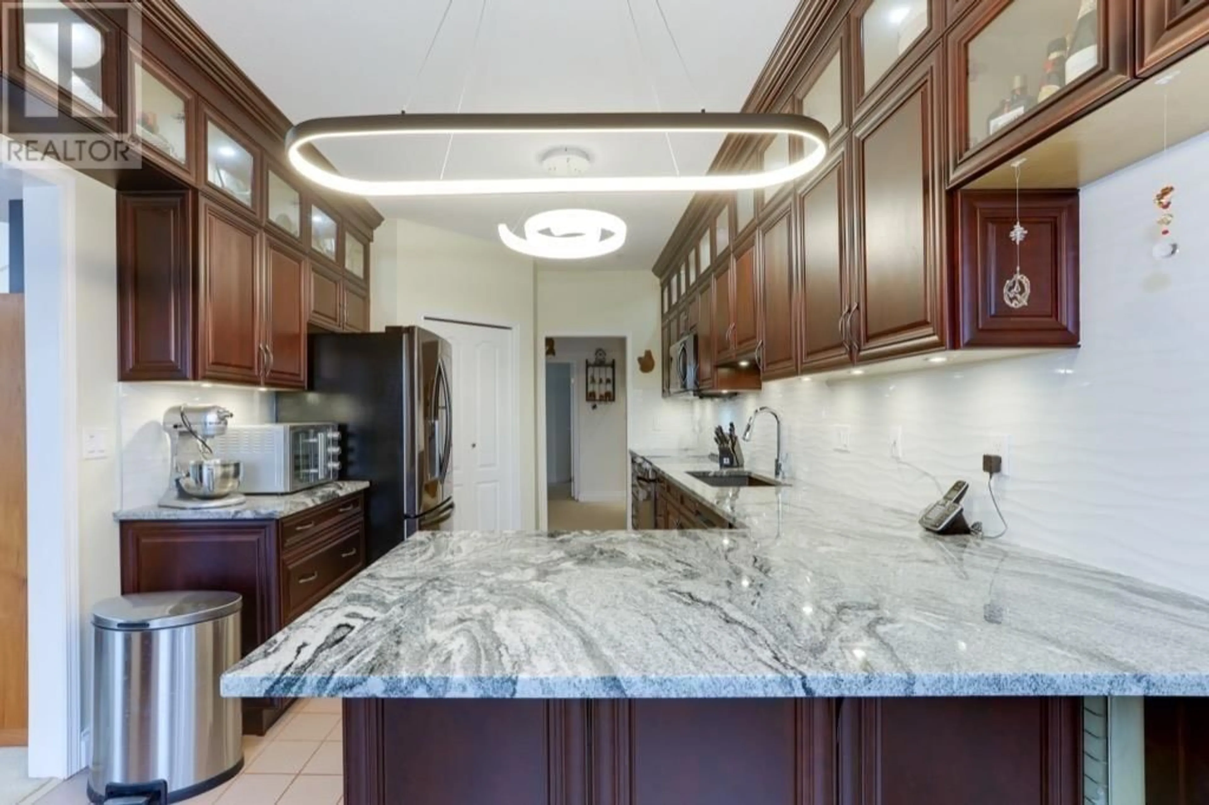 Contemporary kitchen, ceramic/tile floor for 307 - 4743 RIVER ROAD, Delta British Columbia V4K1R9