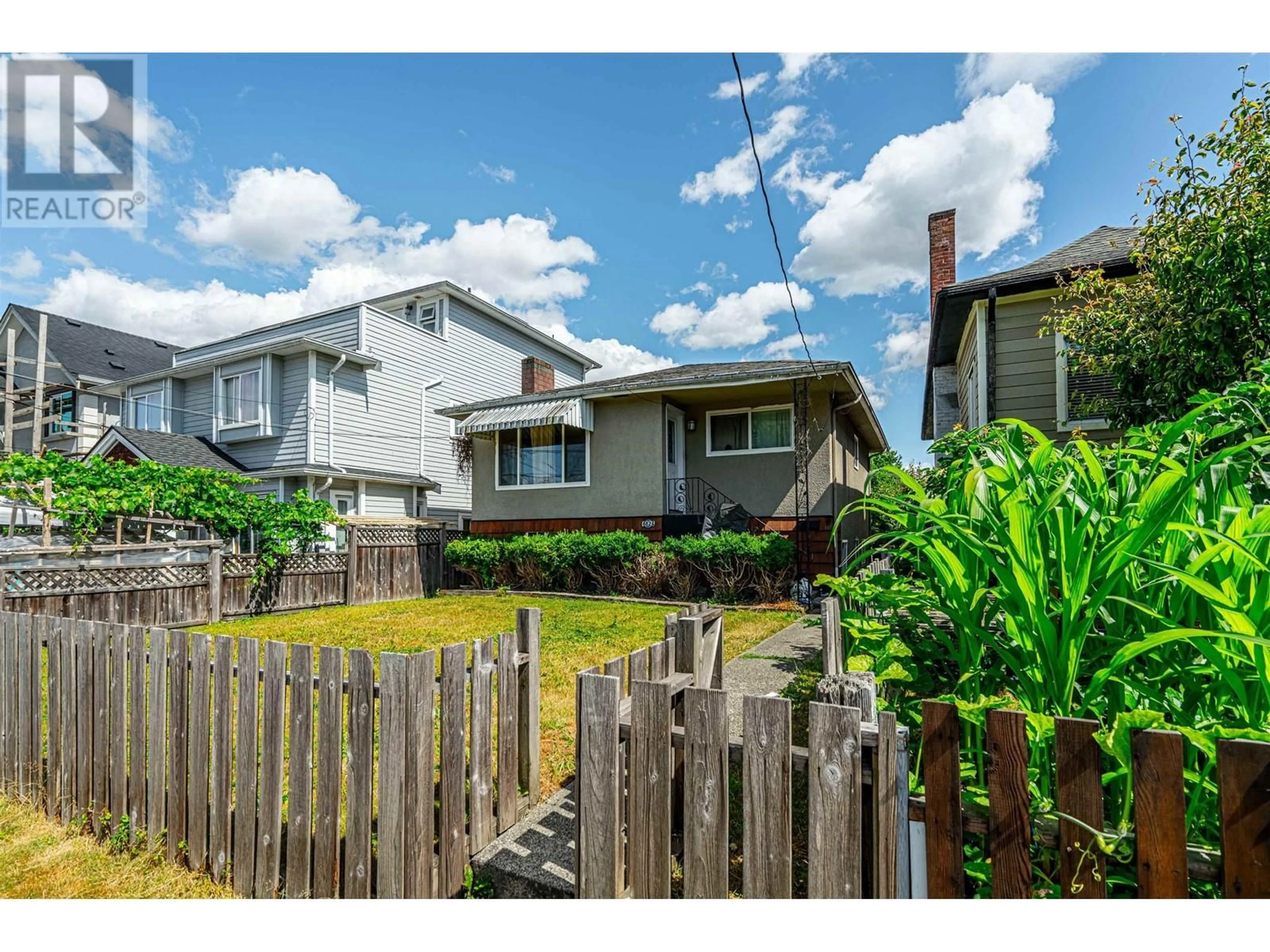 Frontside or backside of a home, the fenced backyard for 4826 EARLES STREET, Vancouver British Columbia V5R3R5