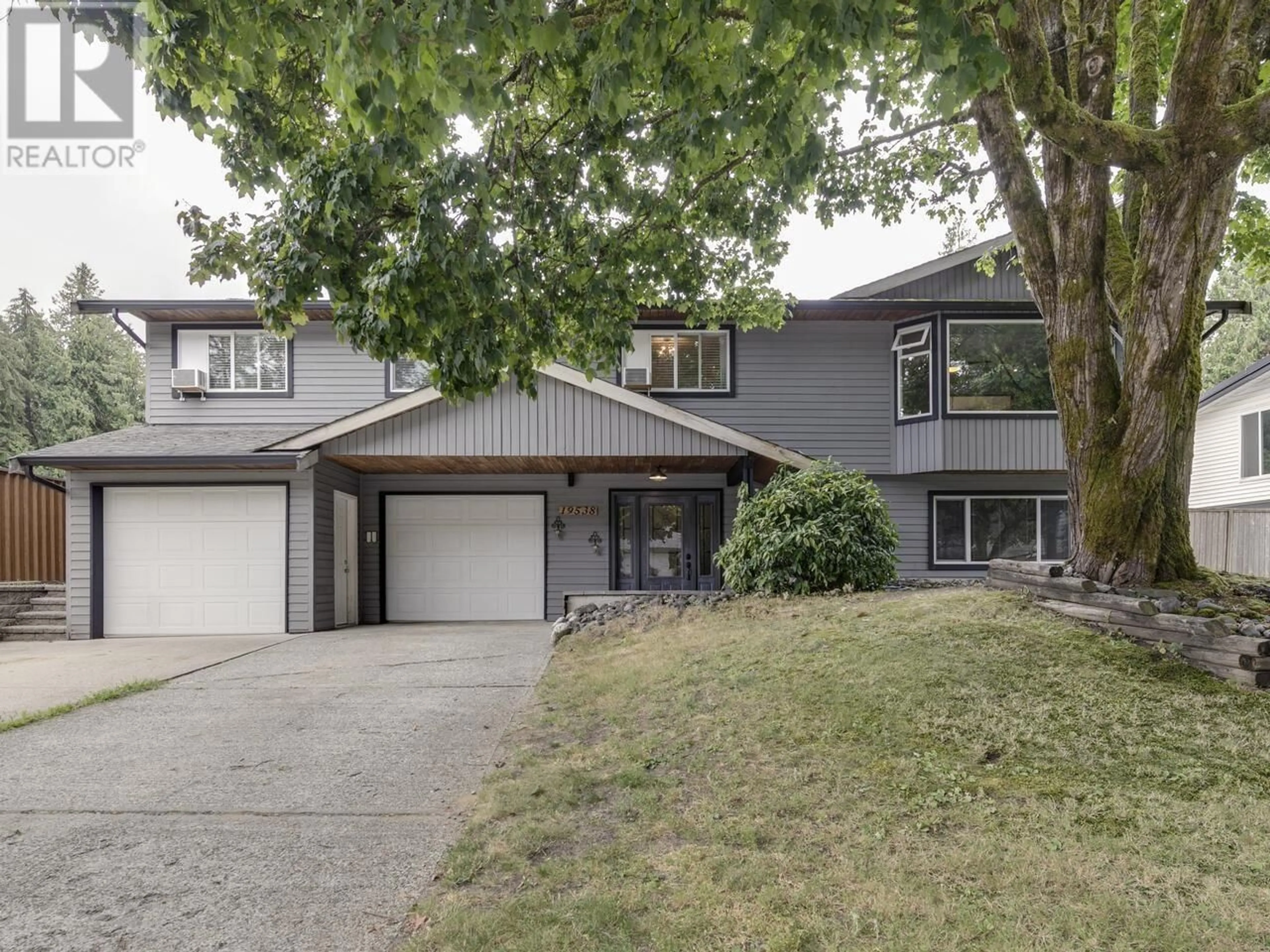 Frontside or backside of a home, the street view for 19538 120B AVENUE, Pitt Meadows British Columbia V3Y1K7