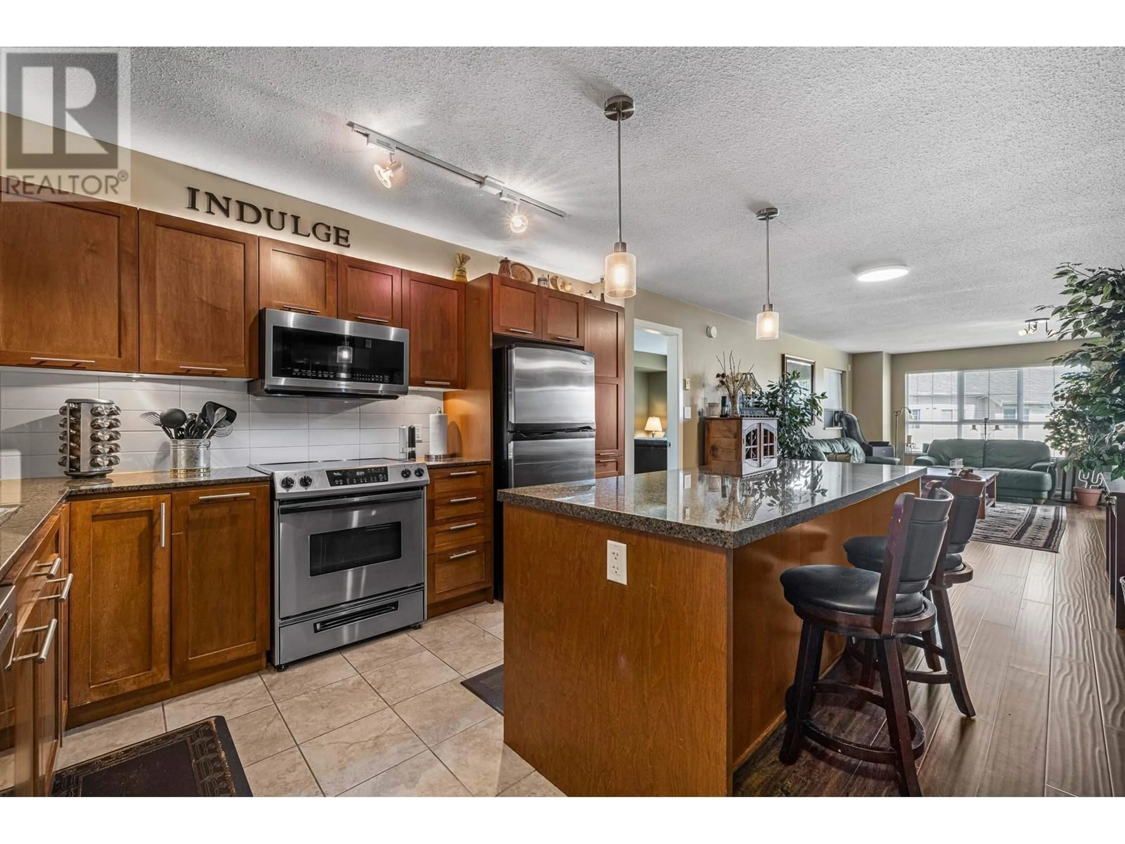 Open concept kitchen for 429 19677 MEADOW GARDENS WAY, Pitt Meadows British Columbia V3Y0A2