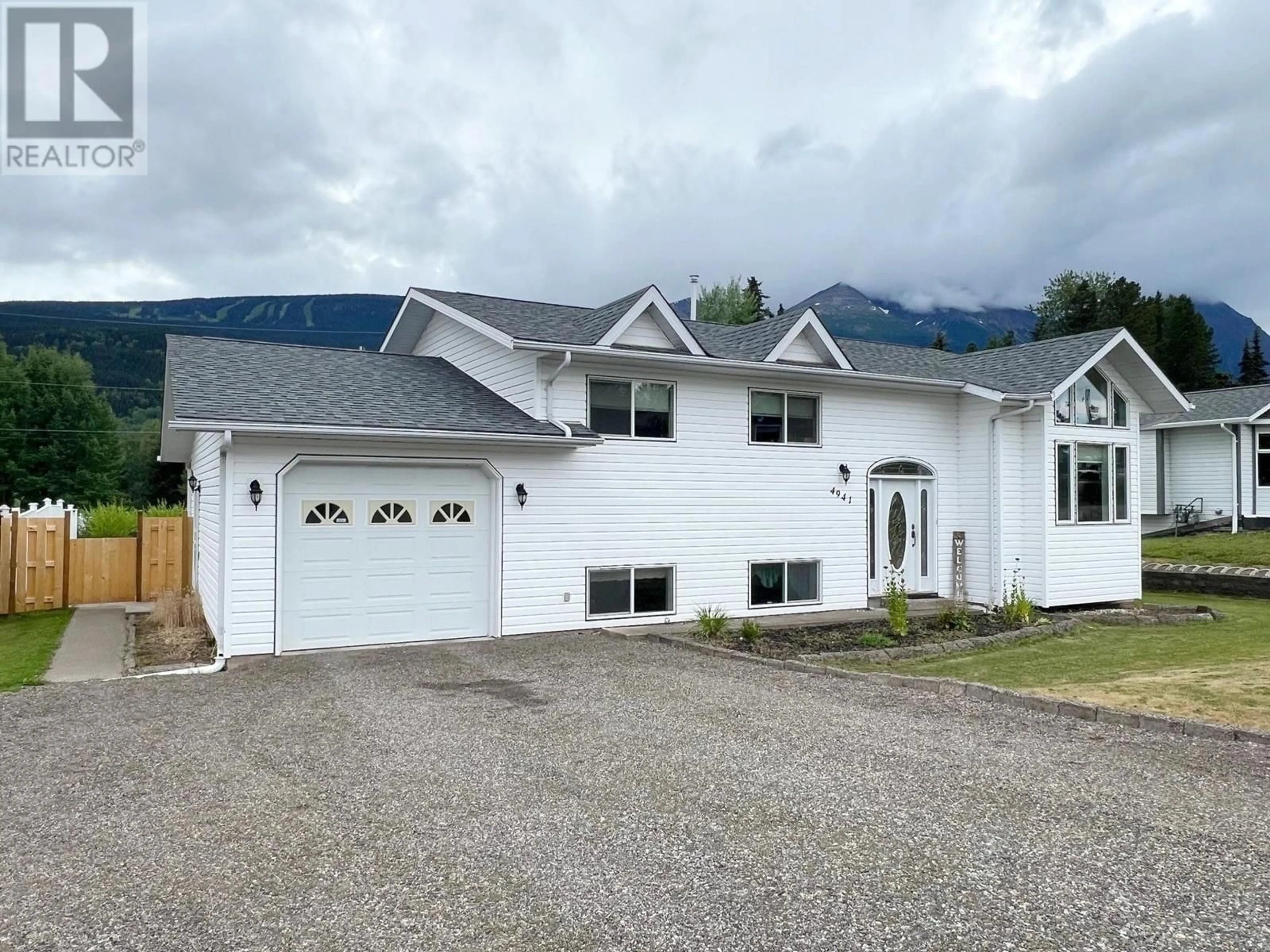 Frontside or backside of a home, the front or back of building for 4941 4TH AVENUE, Smithers British Columbia V0J2N3