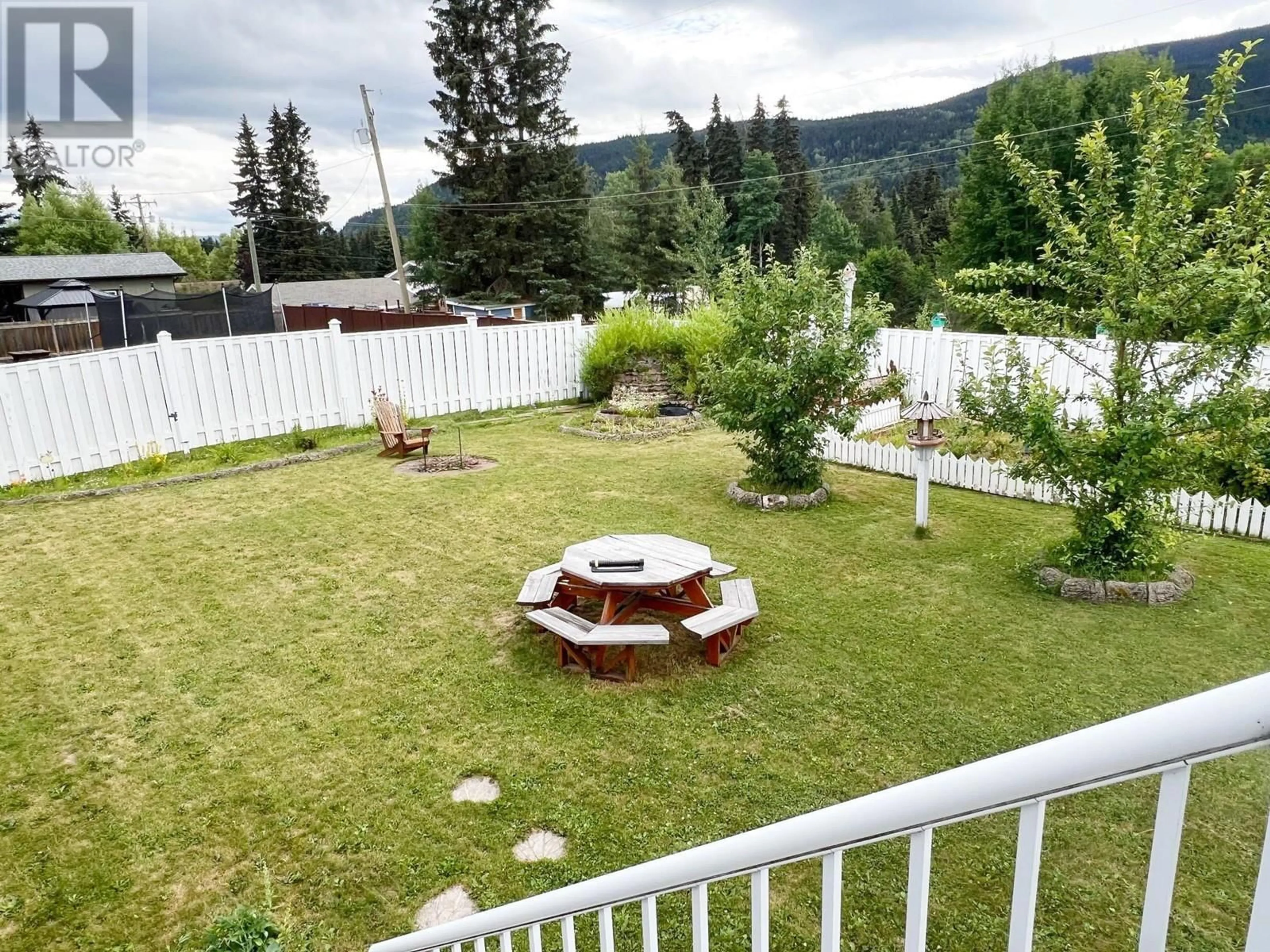 Patio, the fenced backyard for 4941 4TH AVENUE, Smithers British Columbia V0J2N3