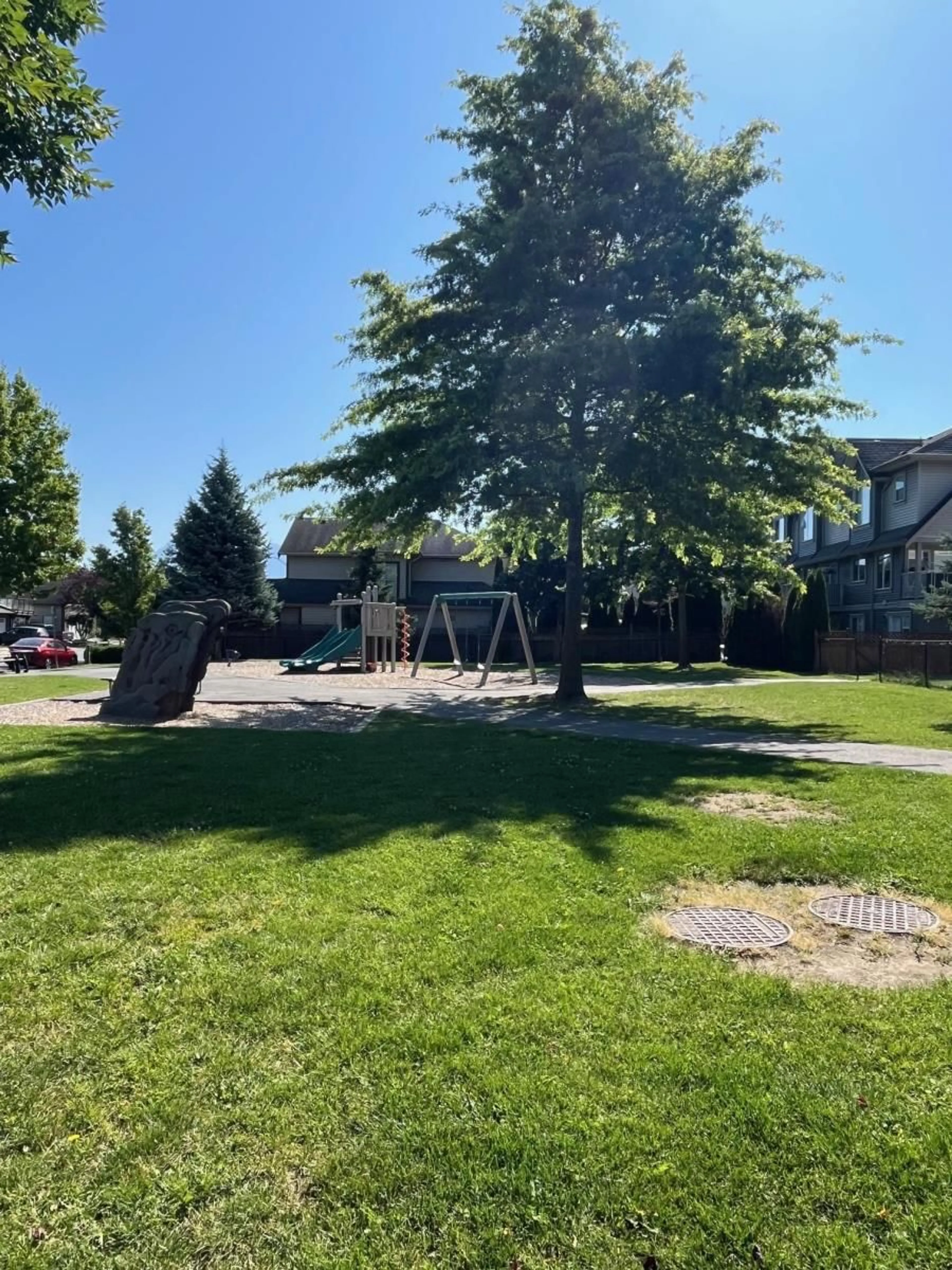 Frontside or backside of a home, the fenced backyard for 45800 SAFFLOWER CRESCENT, Chilliwack British Columbia V2R0H6