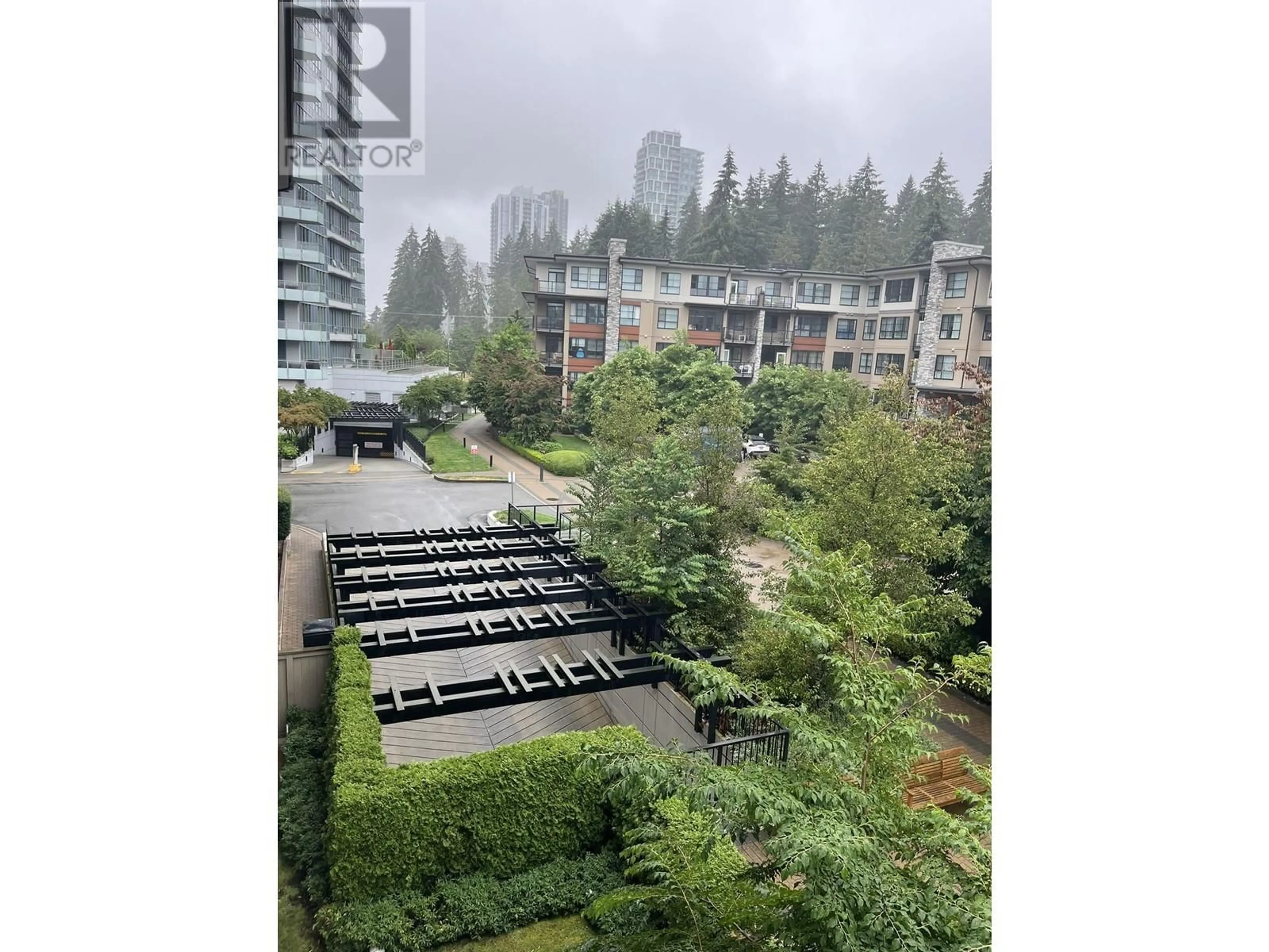 A pic from exterior of the house or condo, the fenced backyard for 309 1135 WINDSOR MEWS, Coquitlam British Columbia V3B0L2