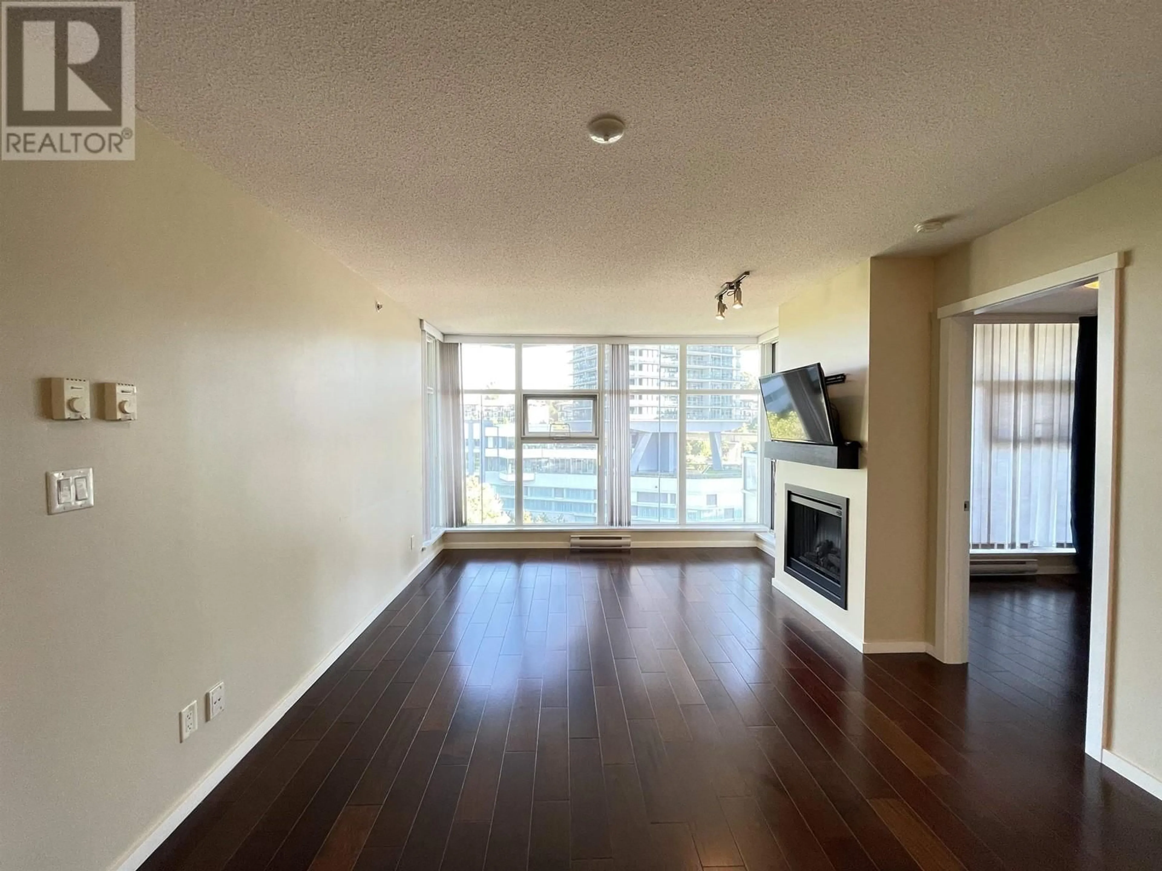 A pic of a room, wood floors for 1102 2289 YUKON CRESCENT, Burnaby British Columbia V5C0B2