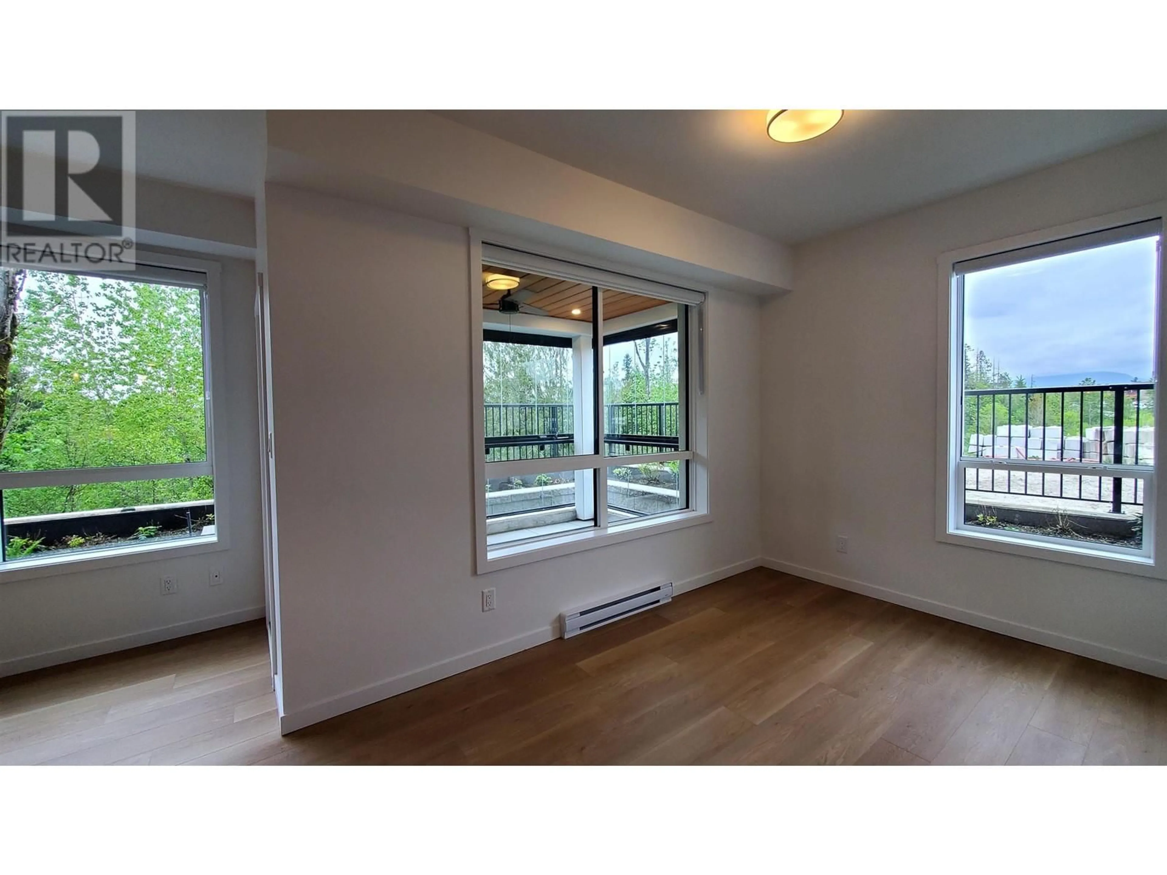 A pic of a room, wood floors for 116 11641 227 STREET, Maple Ridge British Columbia V2X9J6