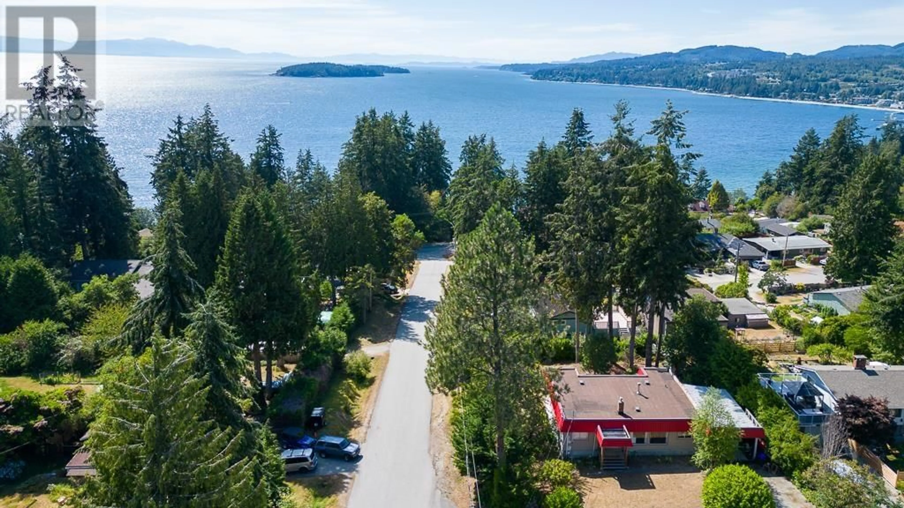 A pic from outside/outdoor area/front of a property/back of a property/a pic from drone, water/lake/river/ocean view for 5197 RADCLIFFE ROAD, Sechelt British Columbia V0N3A2