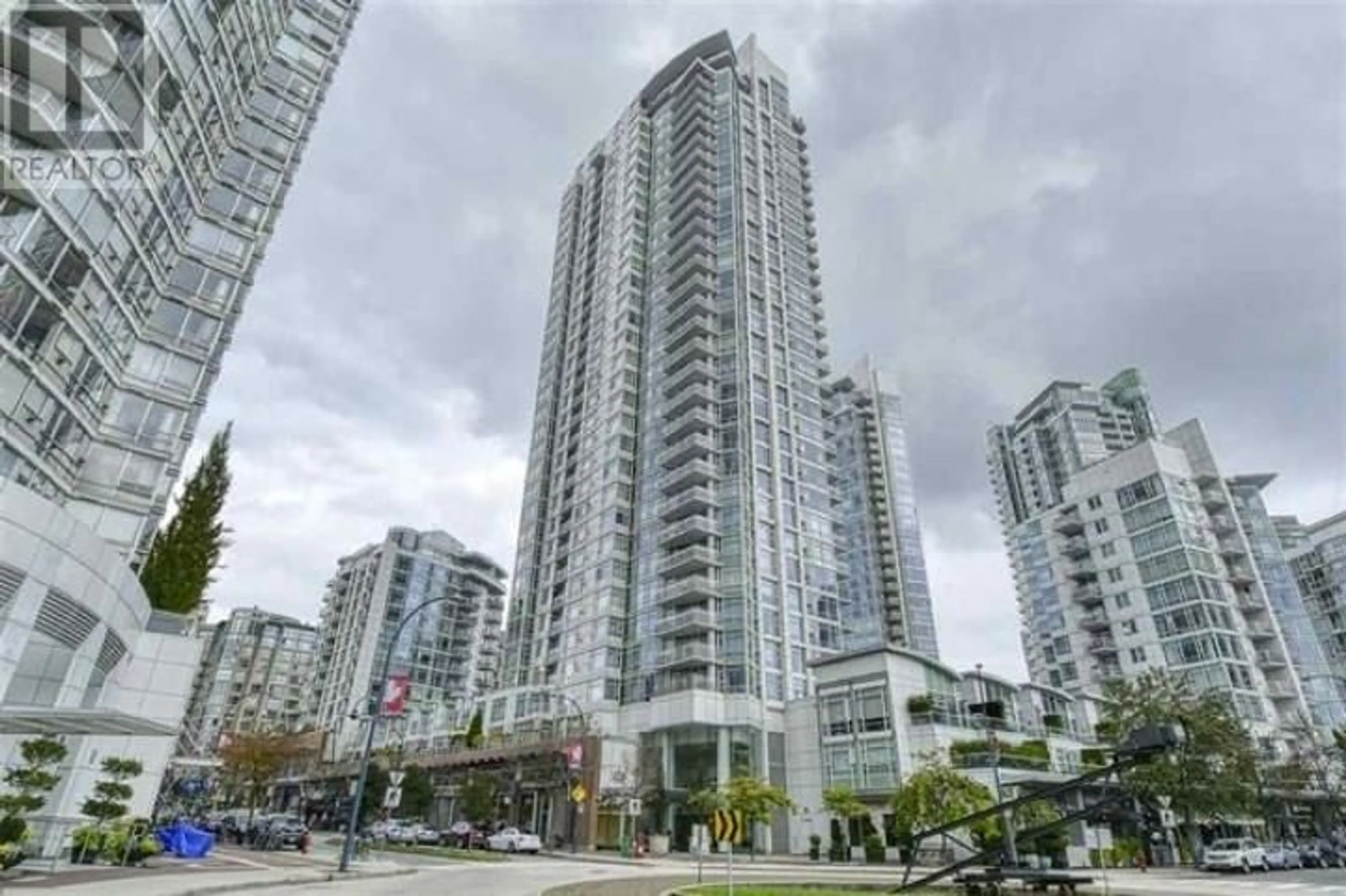 A pic from exterior of the house or condo, the street view for TH E 1199 MARINASIDE CRESCENT, Vancouver British Columbia V6Z2Y2