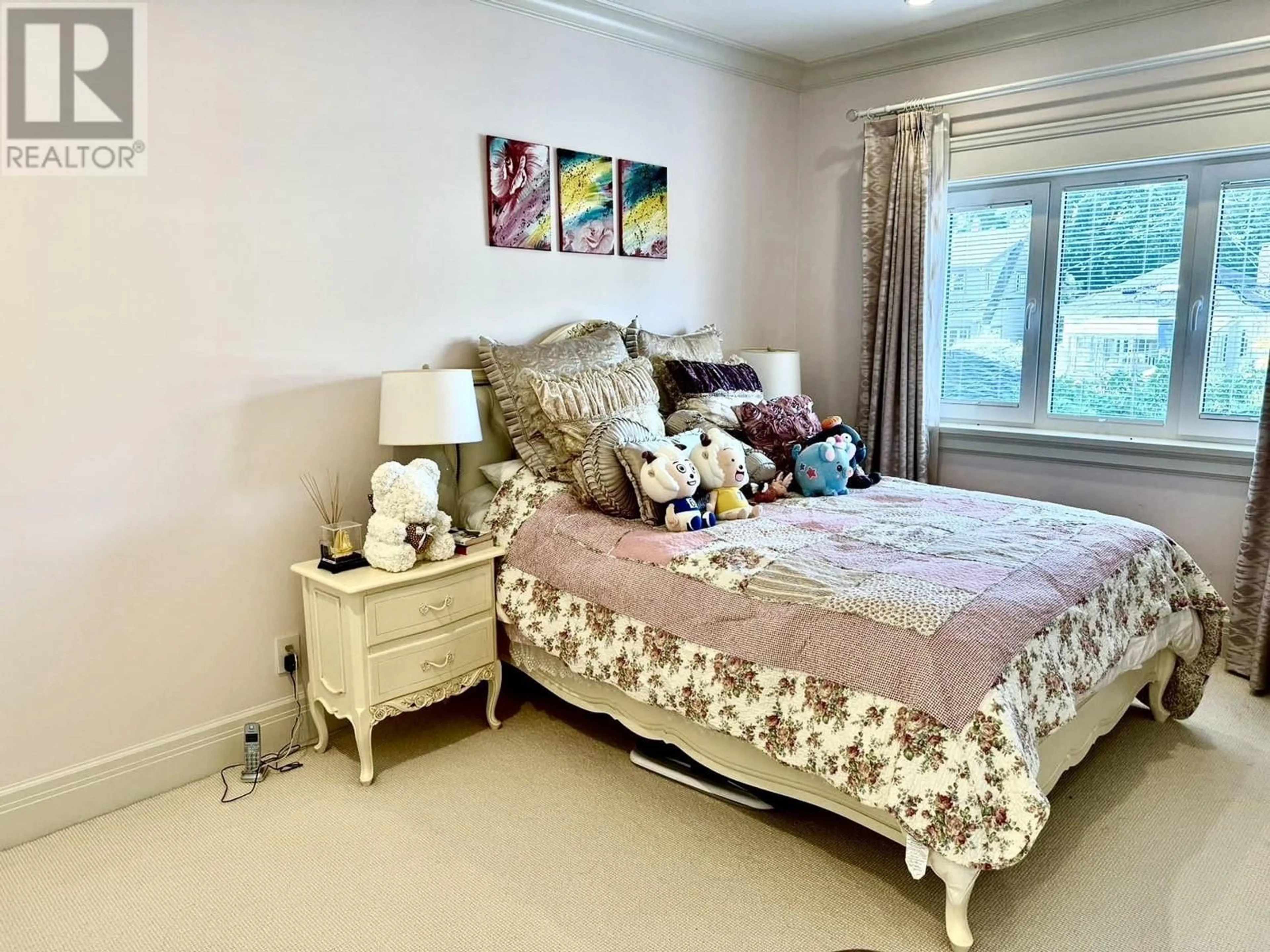 Bedroom with bed, wood/laminate floor for 3695 34TH AVENUE, Vancouver British Columbia V3B2P5