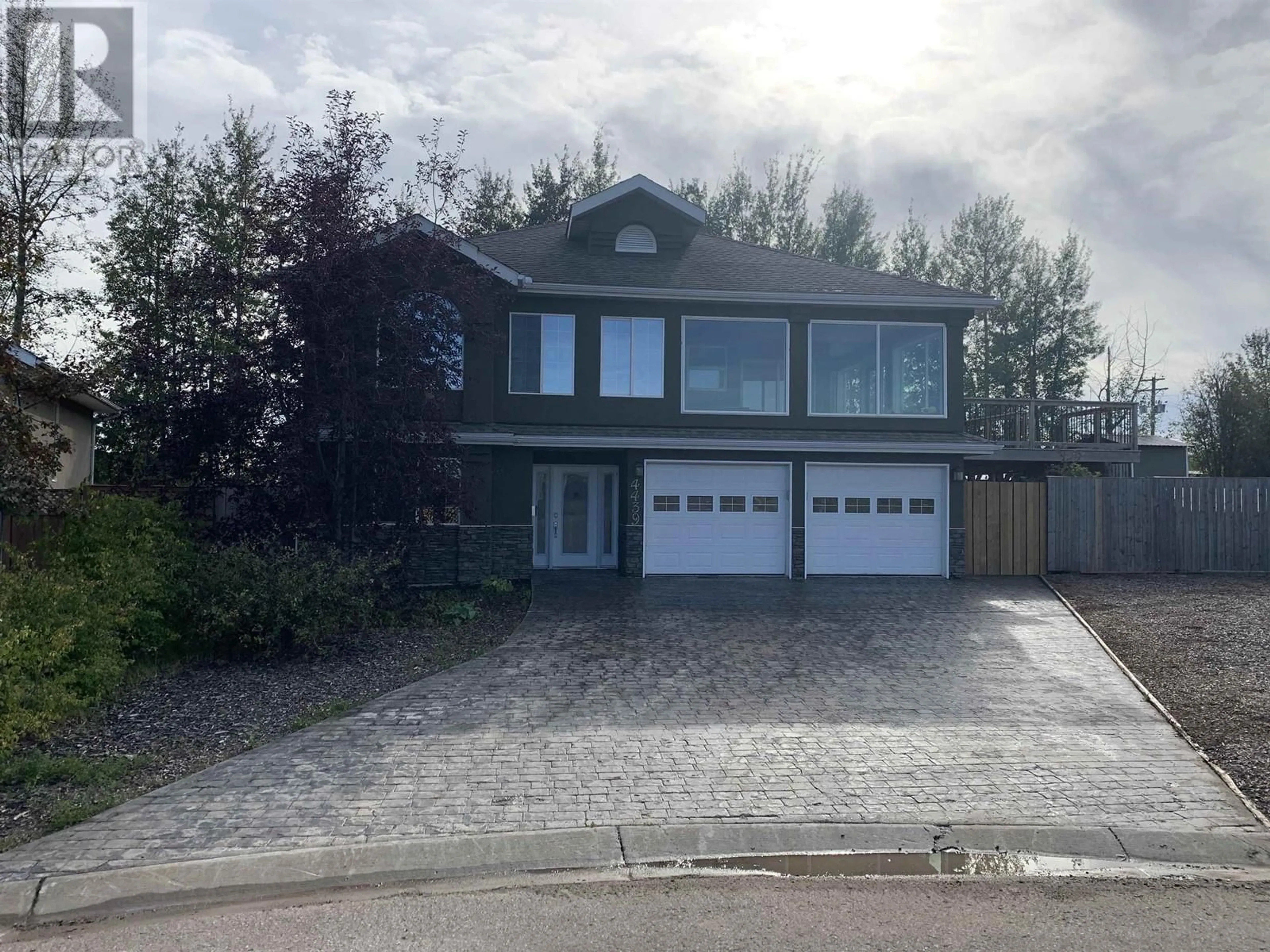 Frontside or backside of a home, cottage for 4439 HERITAGE CRESCENT, Fort Nelson British Columbia V0C1R0