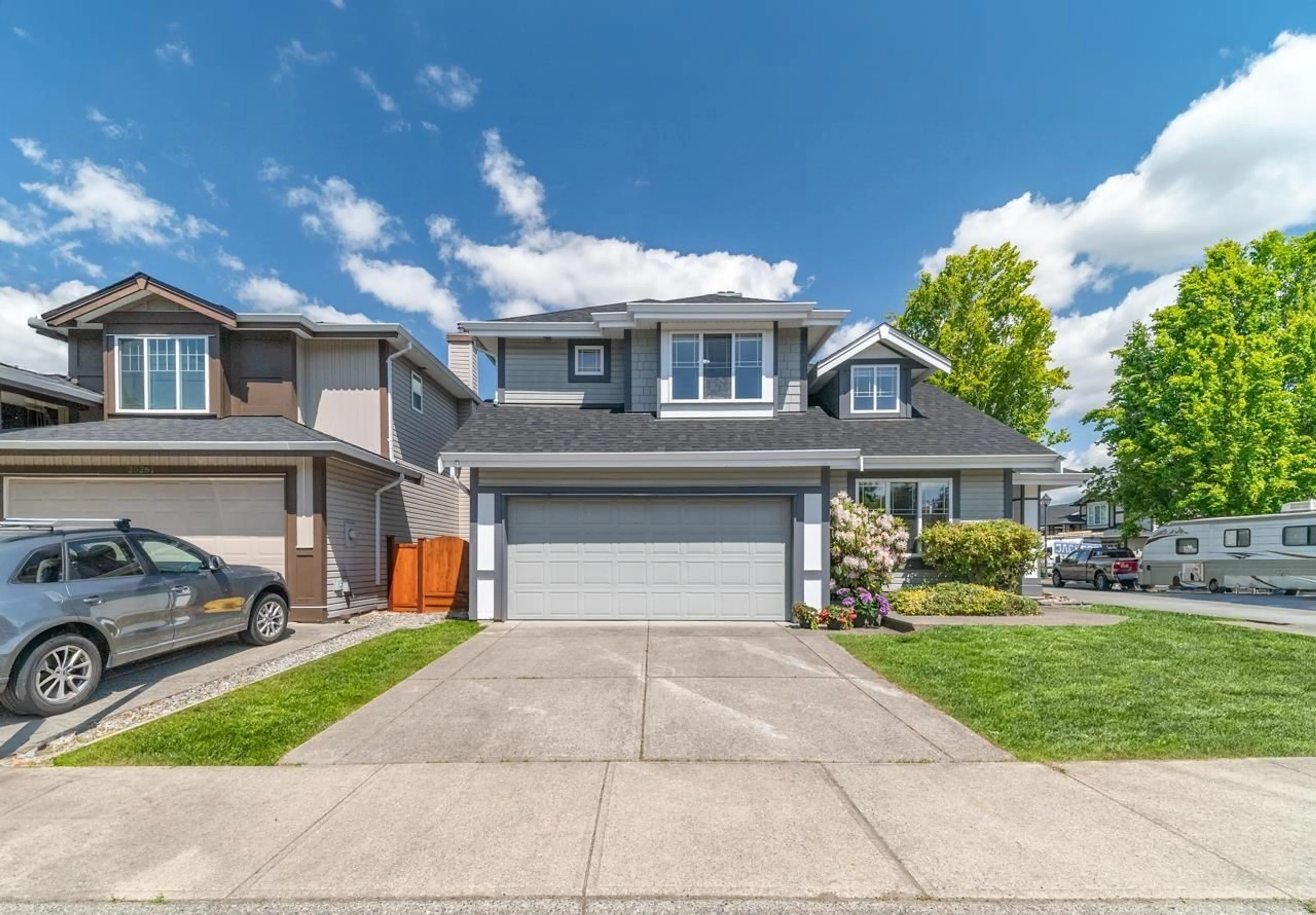 Frontside or backside of a home, the street view for 9407 203 STREET, Langley British Columbia V1M3Y8