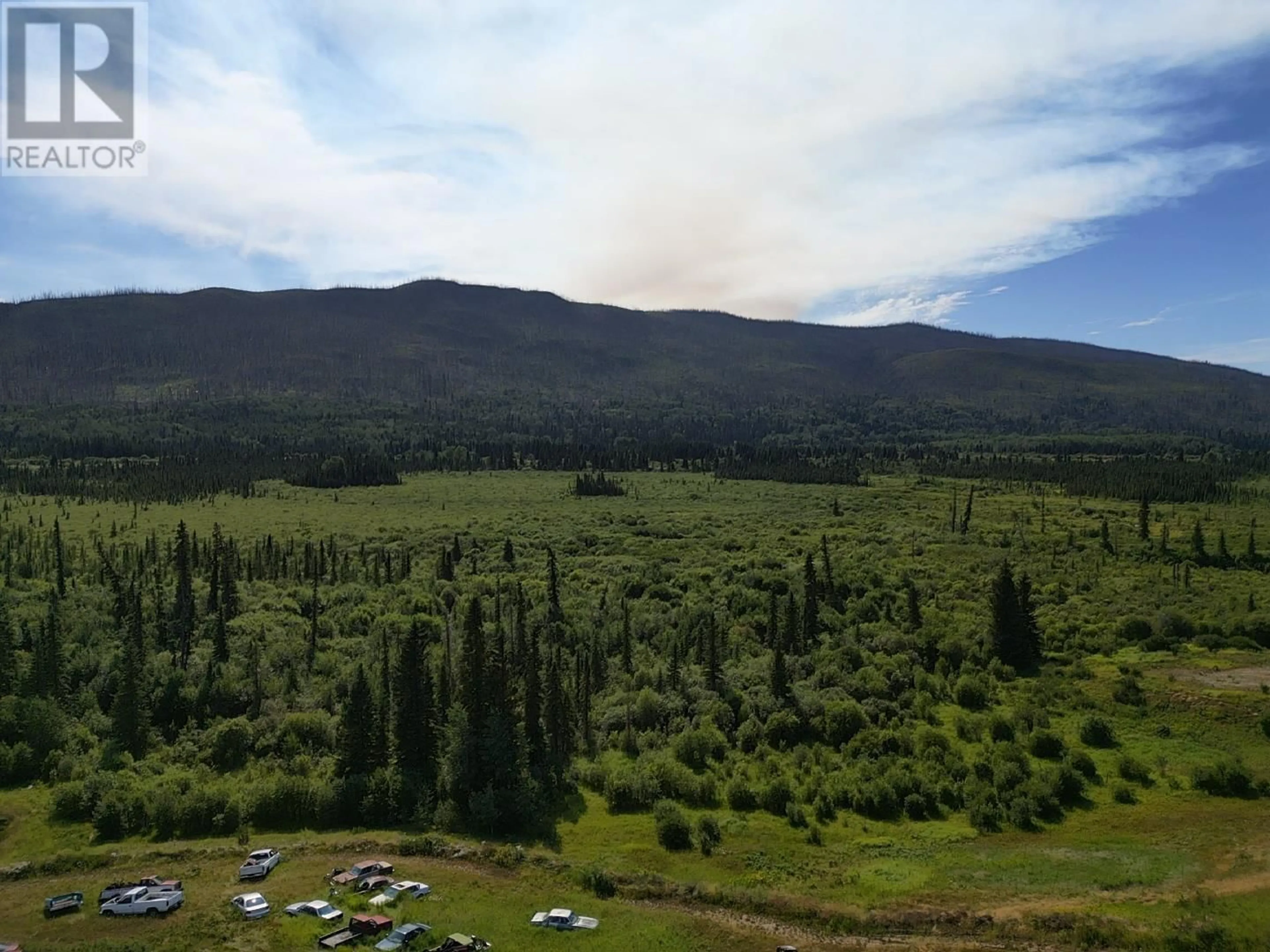 A pic from outside/outdoor area/front of a property/back of a property/a pic from drone, mountain view for 10845 NITHI ROAD, Fraser Lake British Columbia V0J1S0